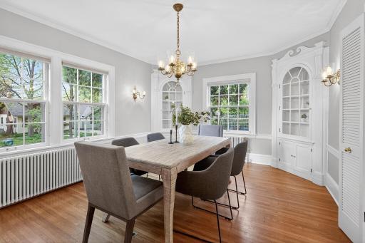 The large formal dining area with original corner built-ins is perfect for entertaining.