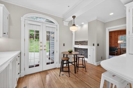 Original French doors open to the stunning back yard.