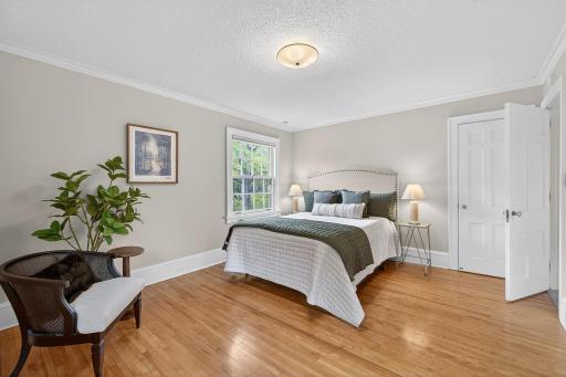Primary bedroom suite with three closets.