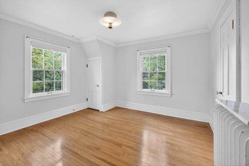 One of four spacious bedrooms on the upper level.
