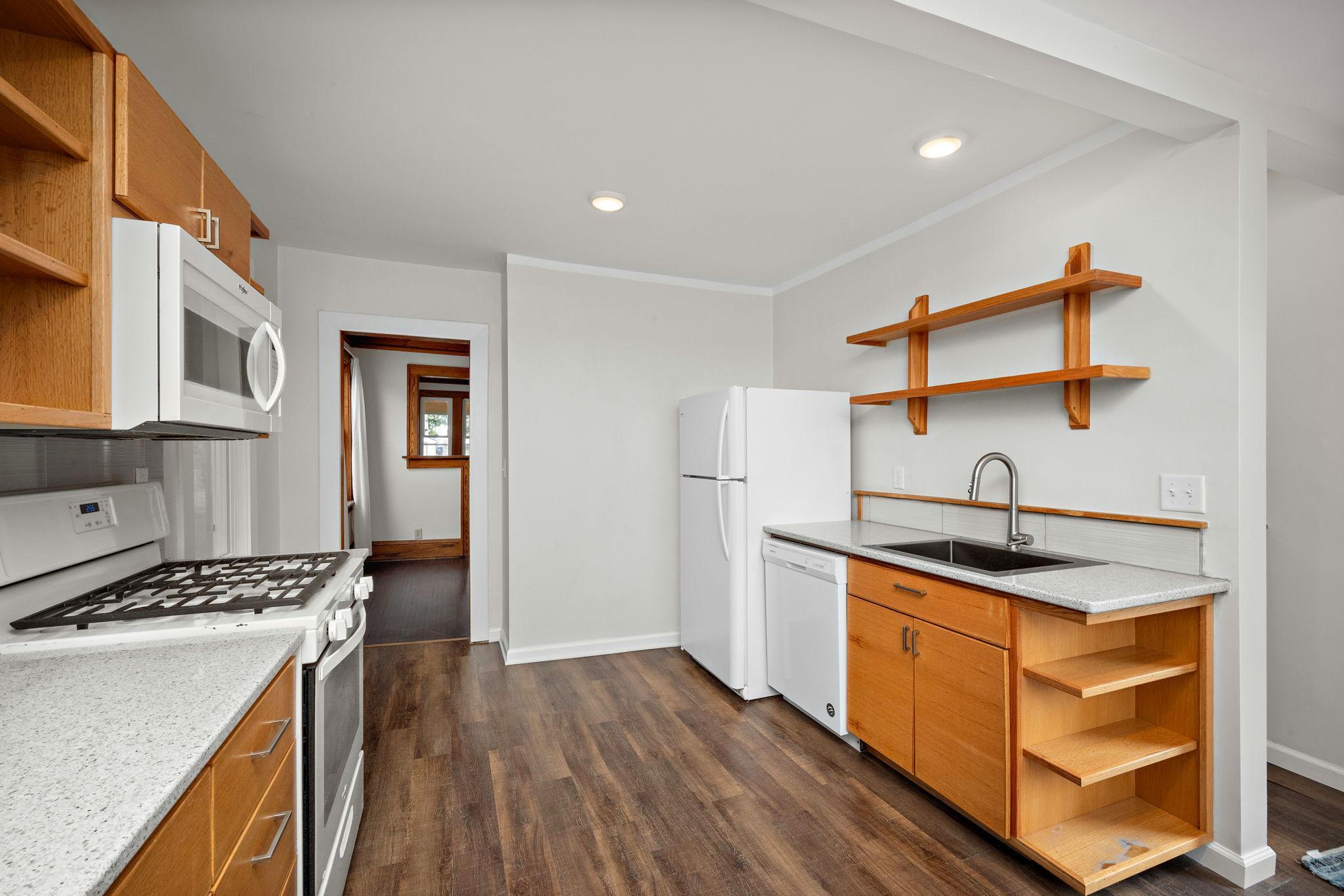 Kitchen was expanded and has lots of prep and storage space. New quartz counters!