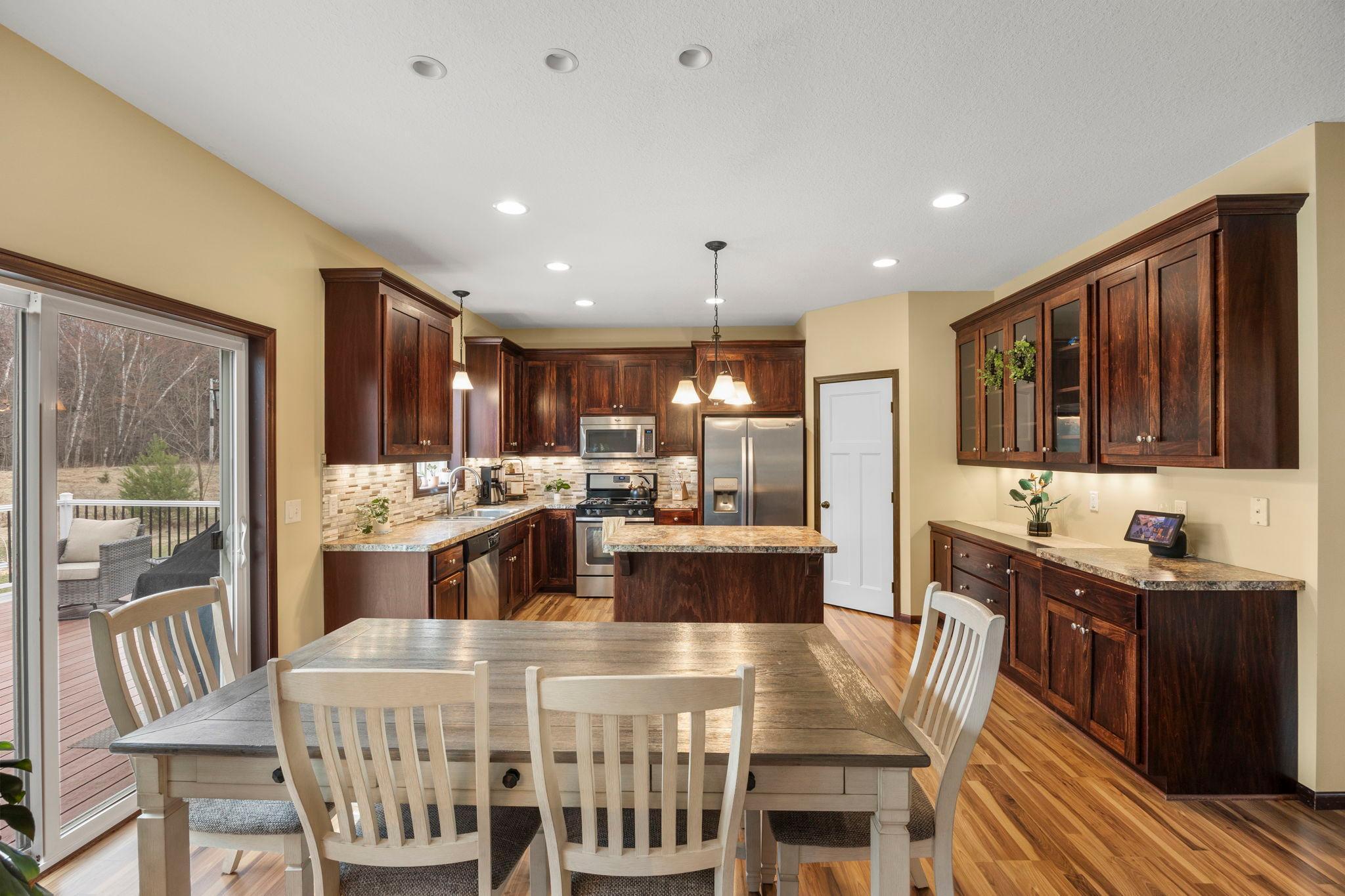 Gourmet kitchen with pantry & stainless appliances