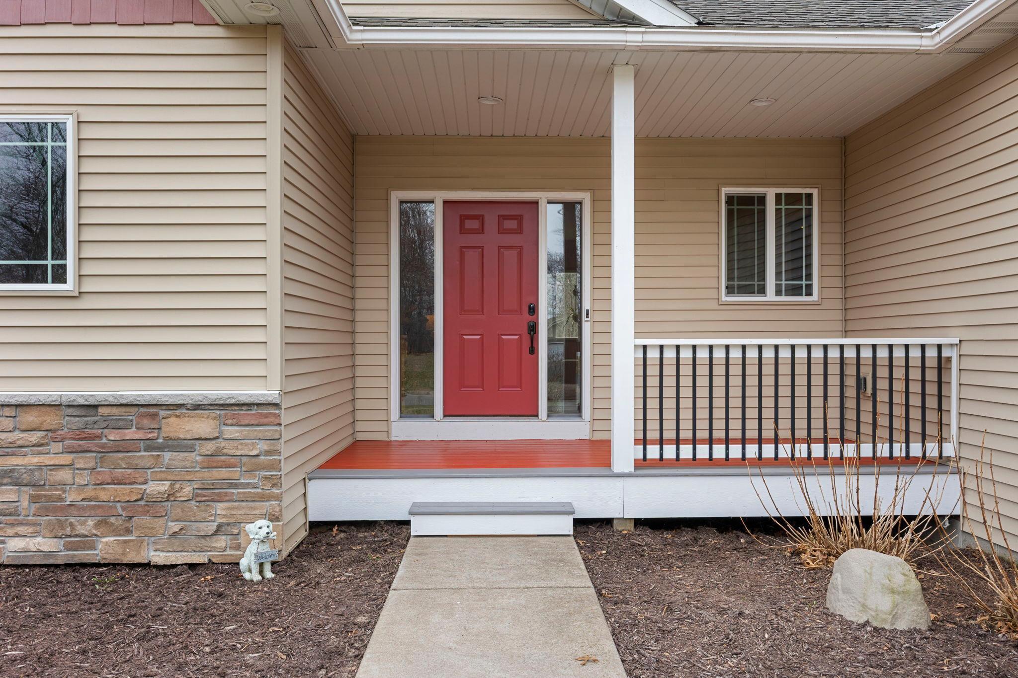 Welcoming front porch with recessed lighting