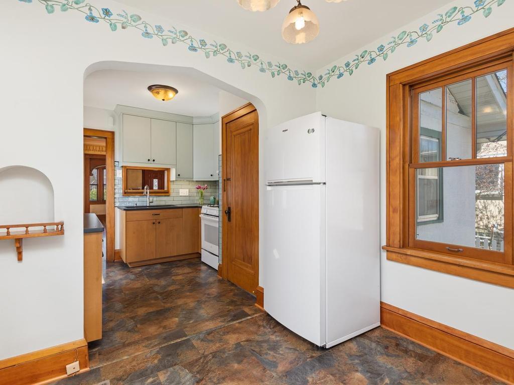 Again, the arched doorway and little shelf/alcove shows the period charm that is sprinkled throughout the home!