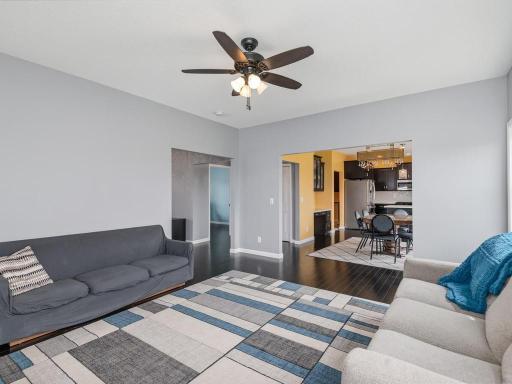 Living Room opens into Dining/Kitchen area.