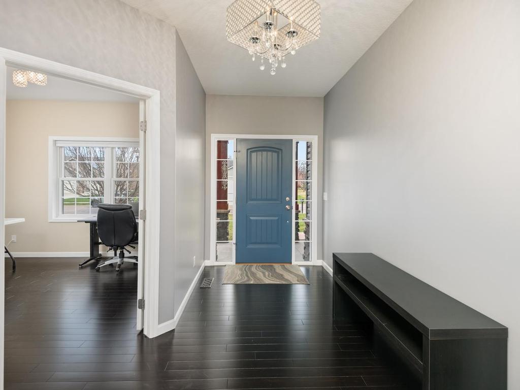 Inviting Foyer with warm bamboo flooring thru-out the main level.