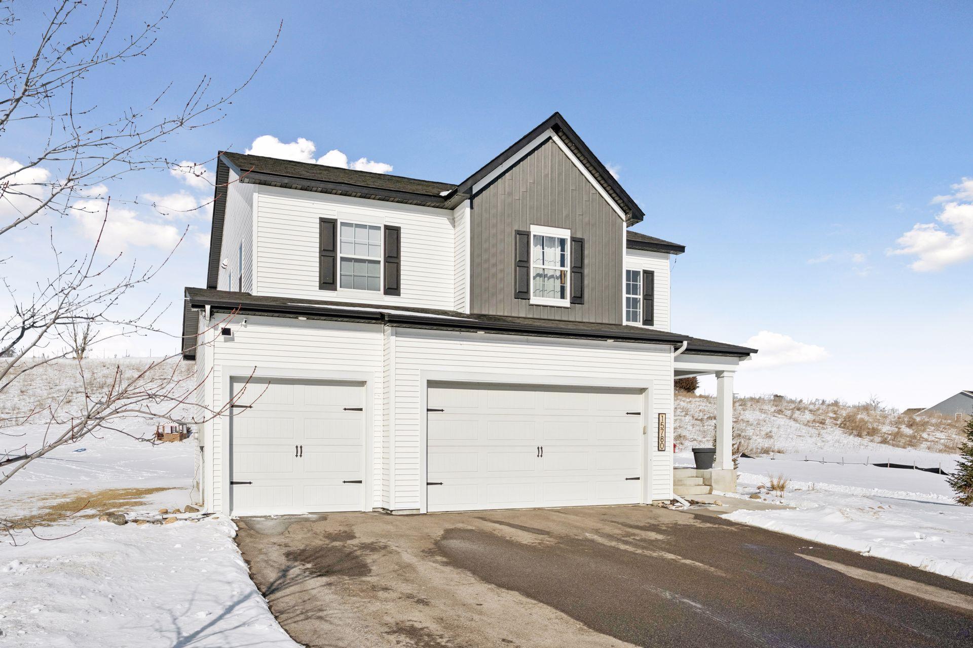 Upgraded 8' insulated garage doors.