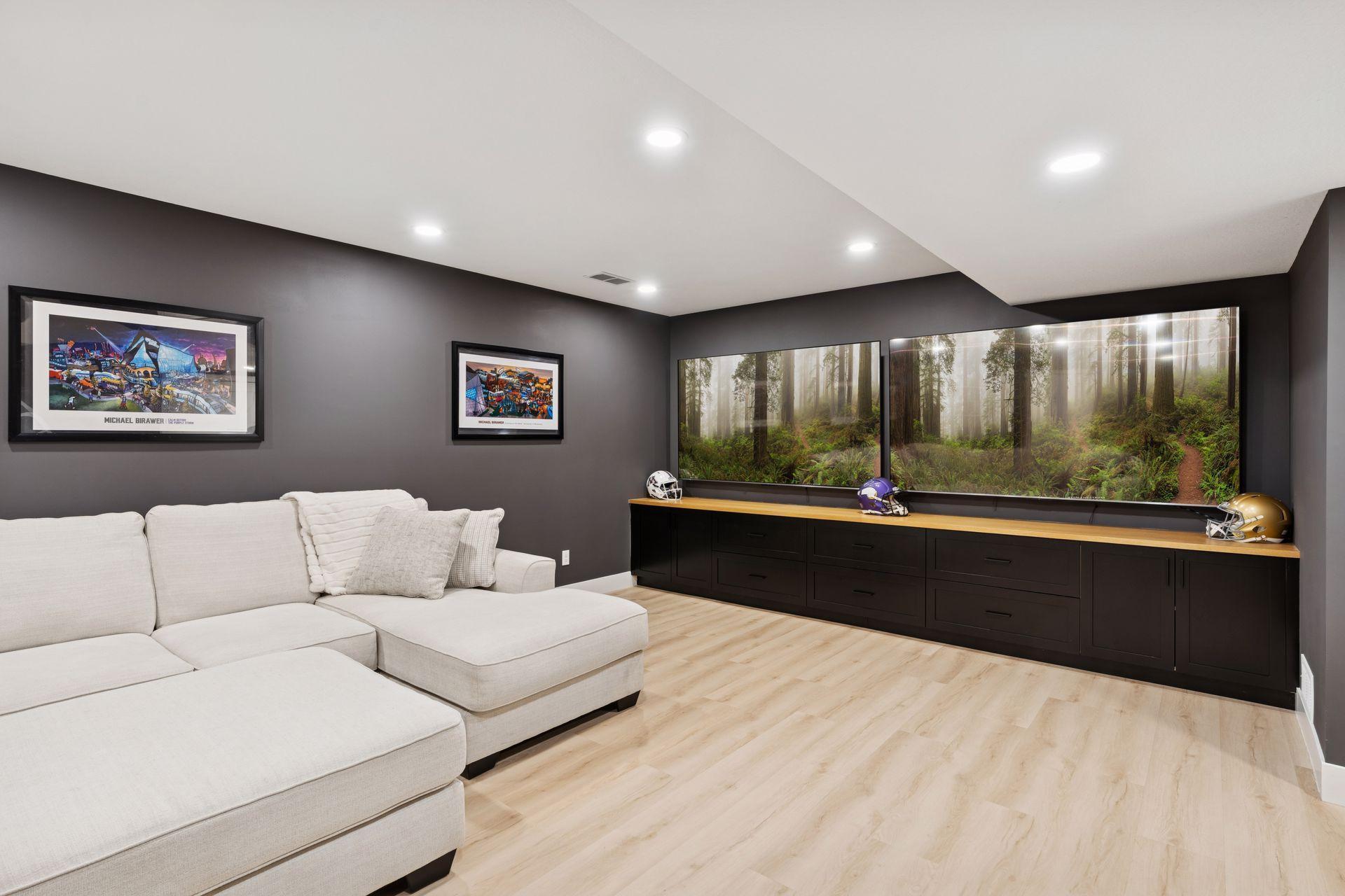 Custom built cabinetry at media center with lots of storage. White oak top with painted black cabinets all with soft close hardware.