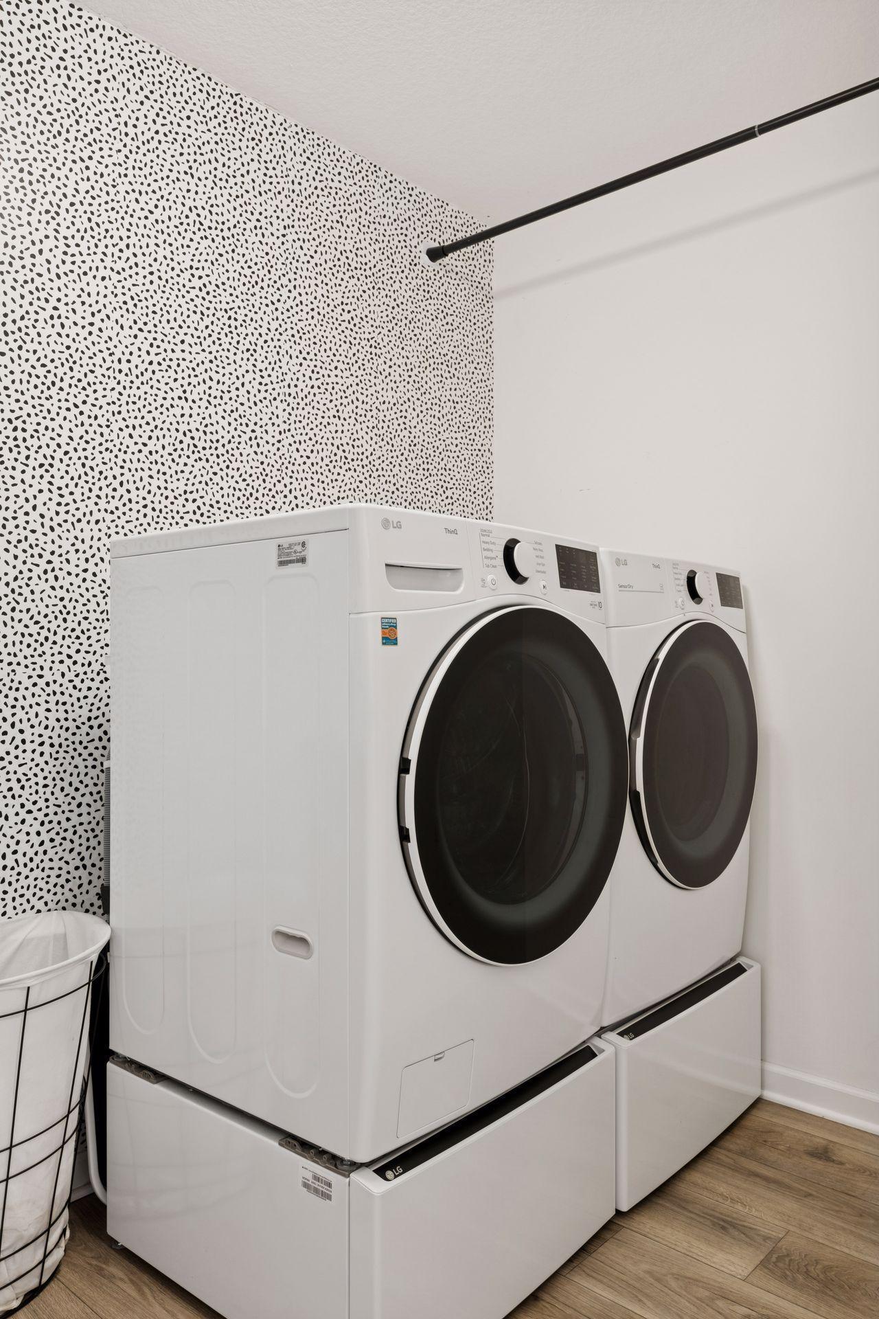 Like new washer and gas dryer with upgraded drawers below.