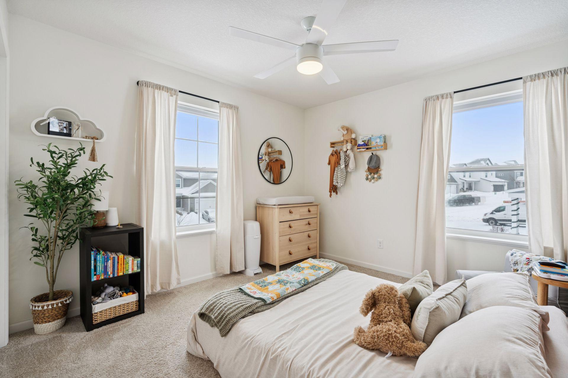 Bedroom #2 with (2) windows overlooking front and side yards.