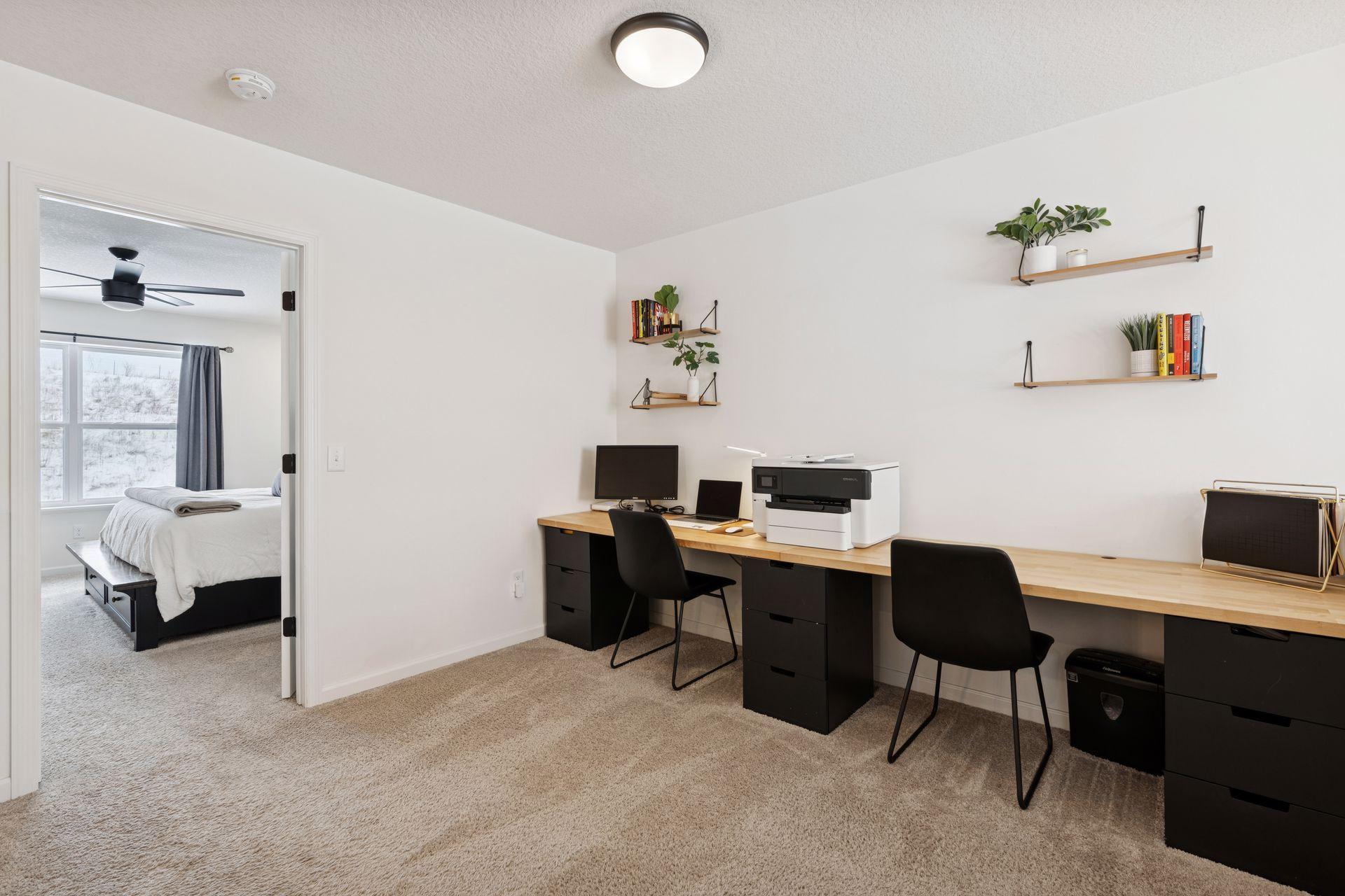 Loft space perfect for flex office space, kids work station, or even reading nook.