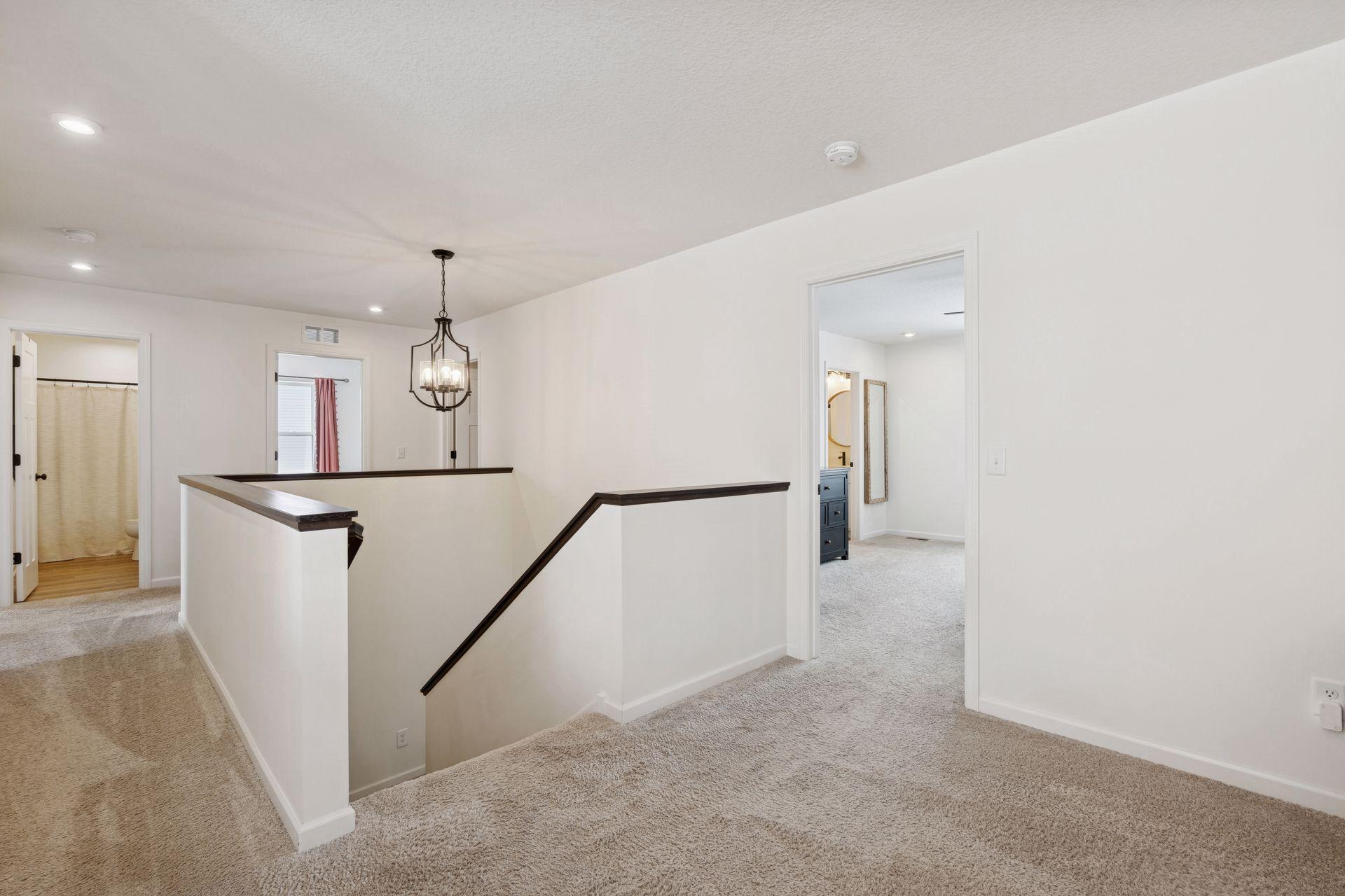 Second floor loft with ample natural light and recessed LED lighting throughout.