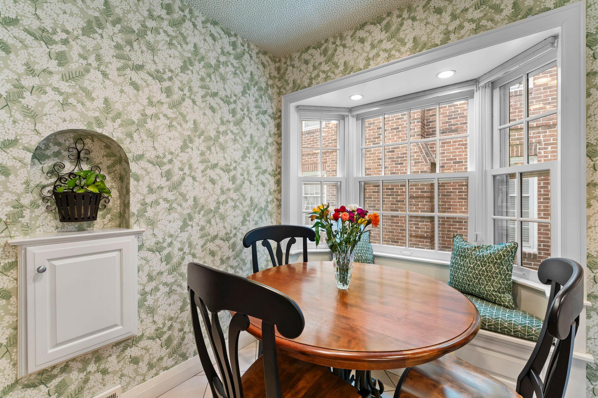 Informal dining space has built-in bench