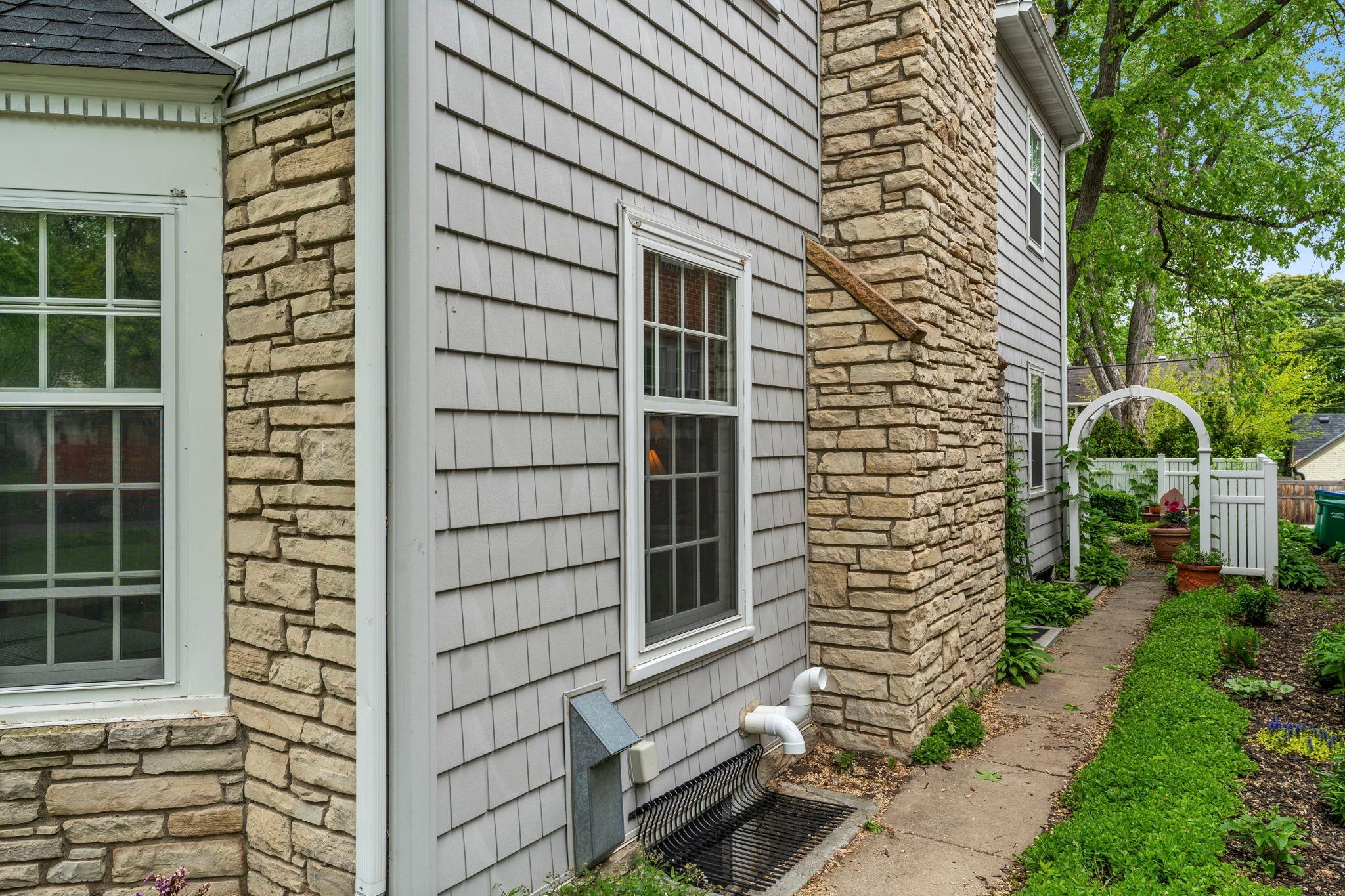 Sidewalk leading to backyard