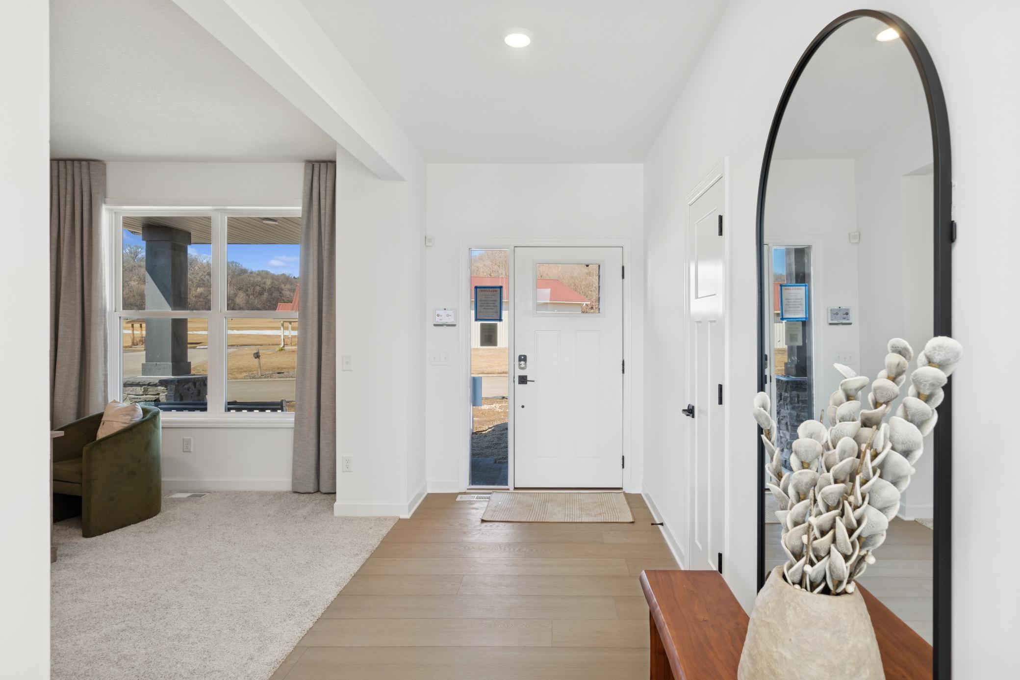 (Photo of Actual Model Home) The open foyer to the home.