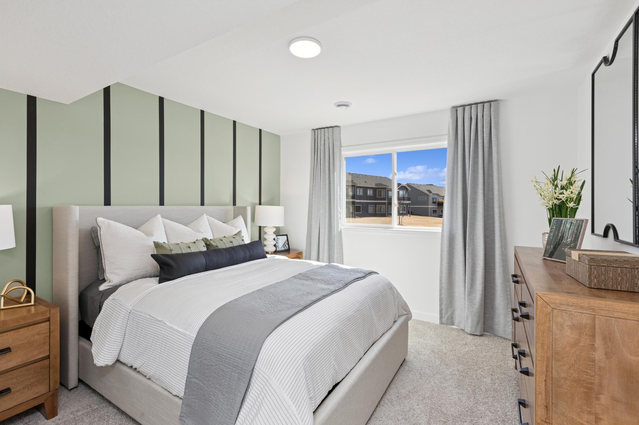 (Photo of Actual Model Home) A 5th bedroom located on the lower level.