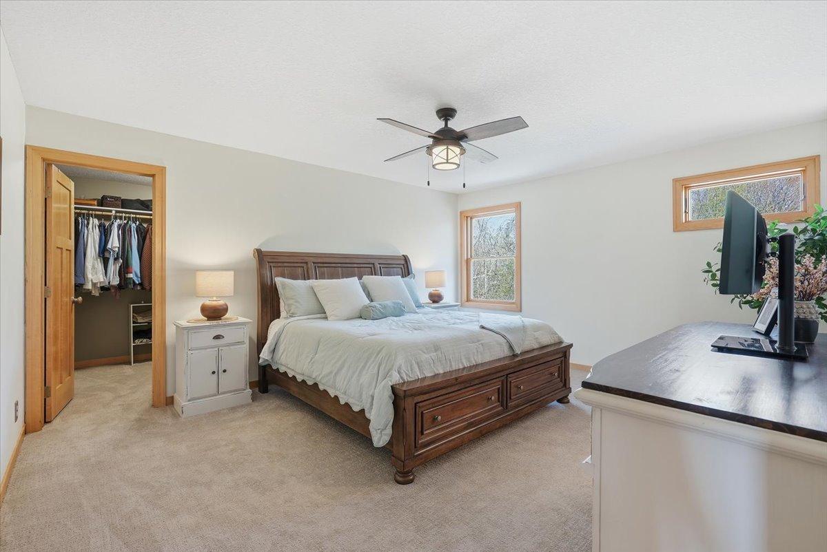 Primary bedroom #1 complete with large walk-in closet and attached en-suite bathroom