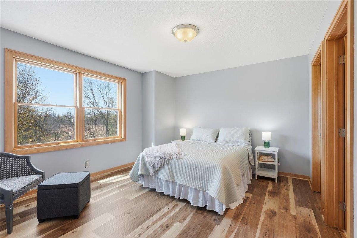 Additional primary bedroom with attached walk-in closet and attached, private en-suite bathroom