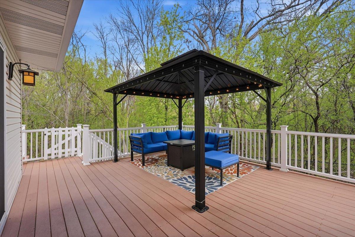 Outdoor living and entertaining space just off the kitchen and wet bar
