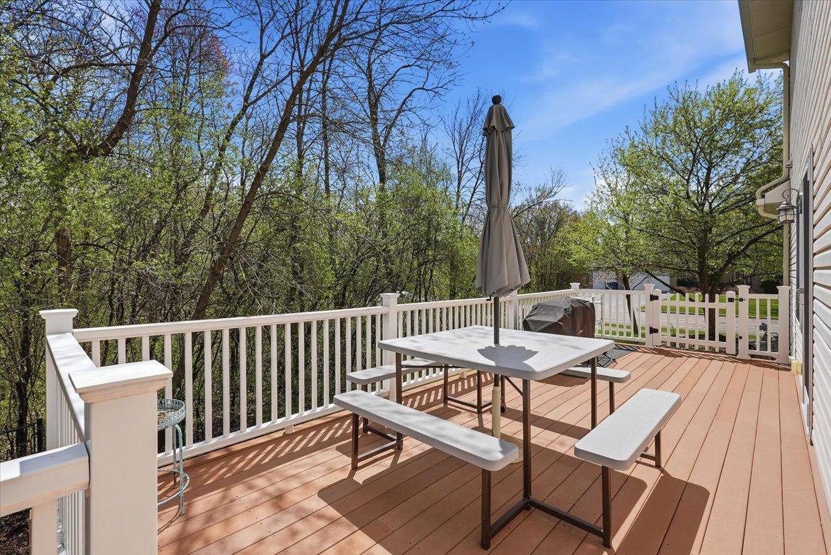 This is a portion of the stunning deck that wraps around this grand home