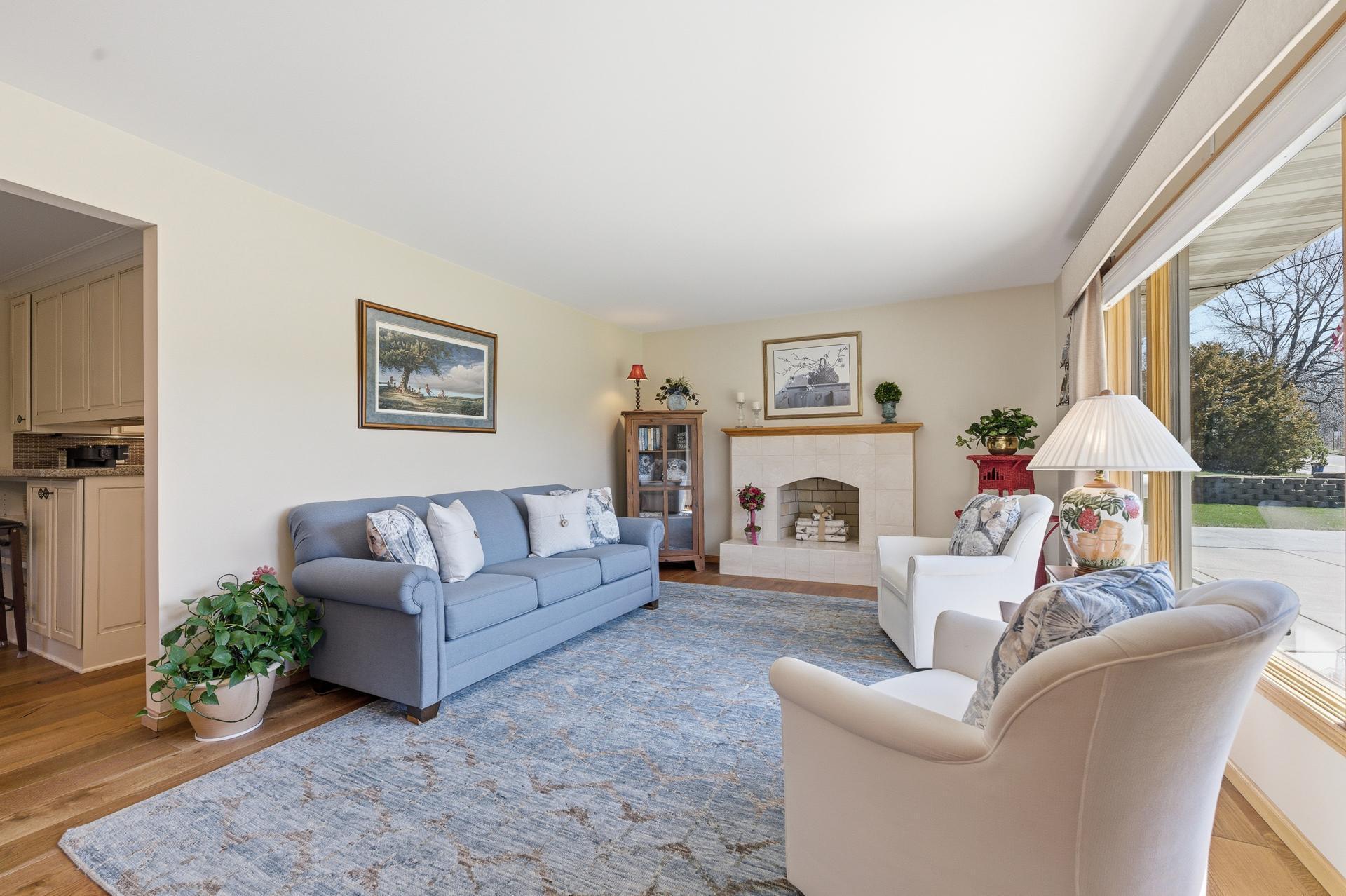 Hardwood floors throughout main level common areas.