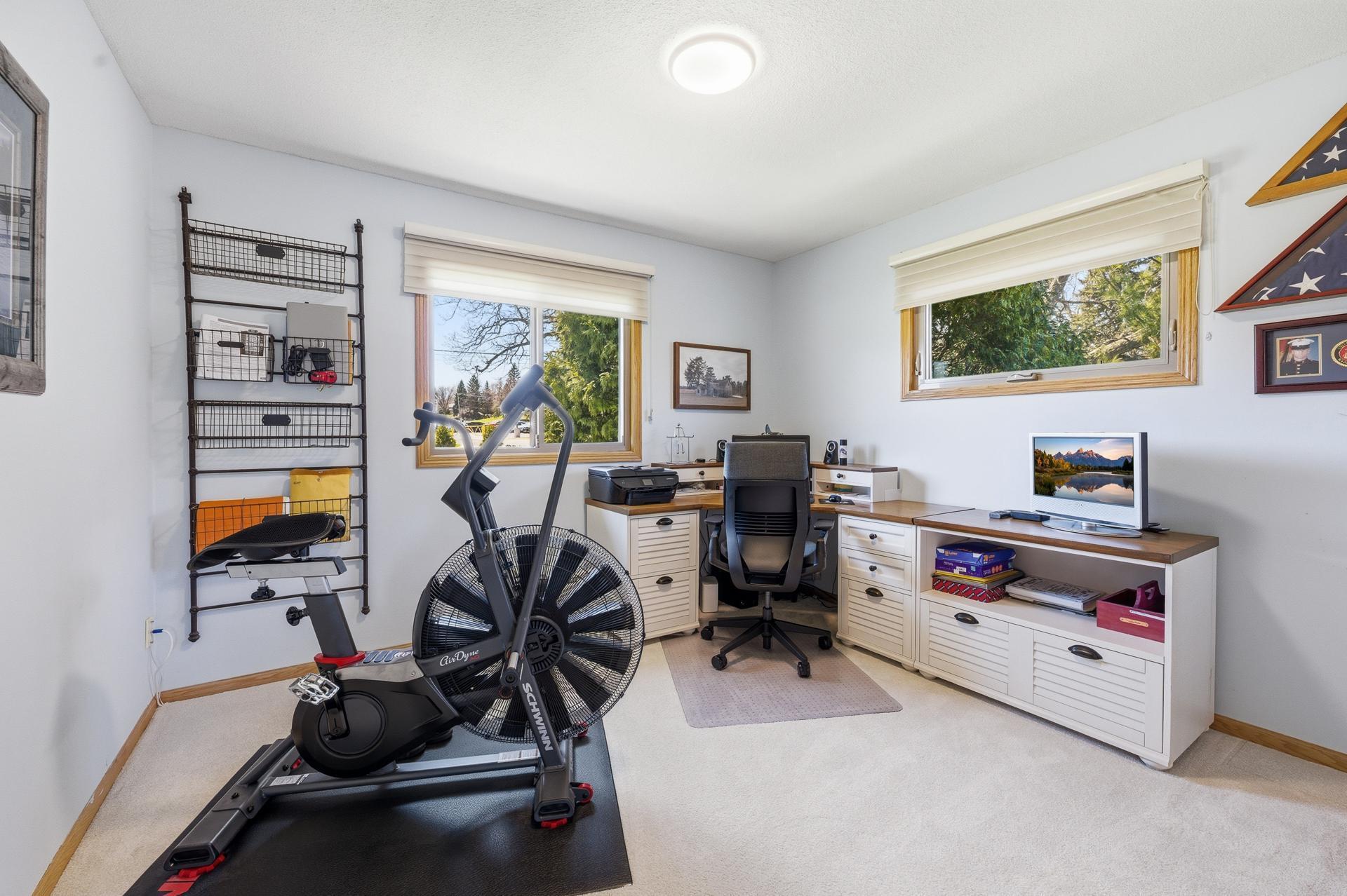 Main level 2nd bedroom is currently used as an office/exercise room. 10.5x11.5.