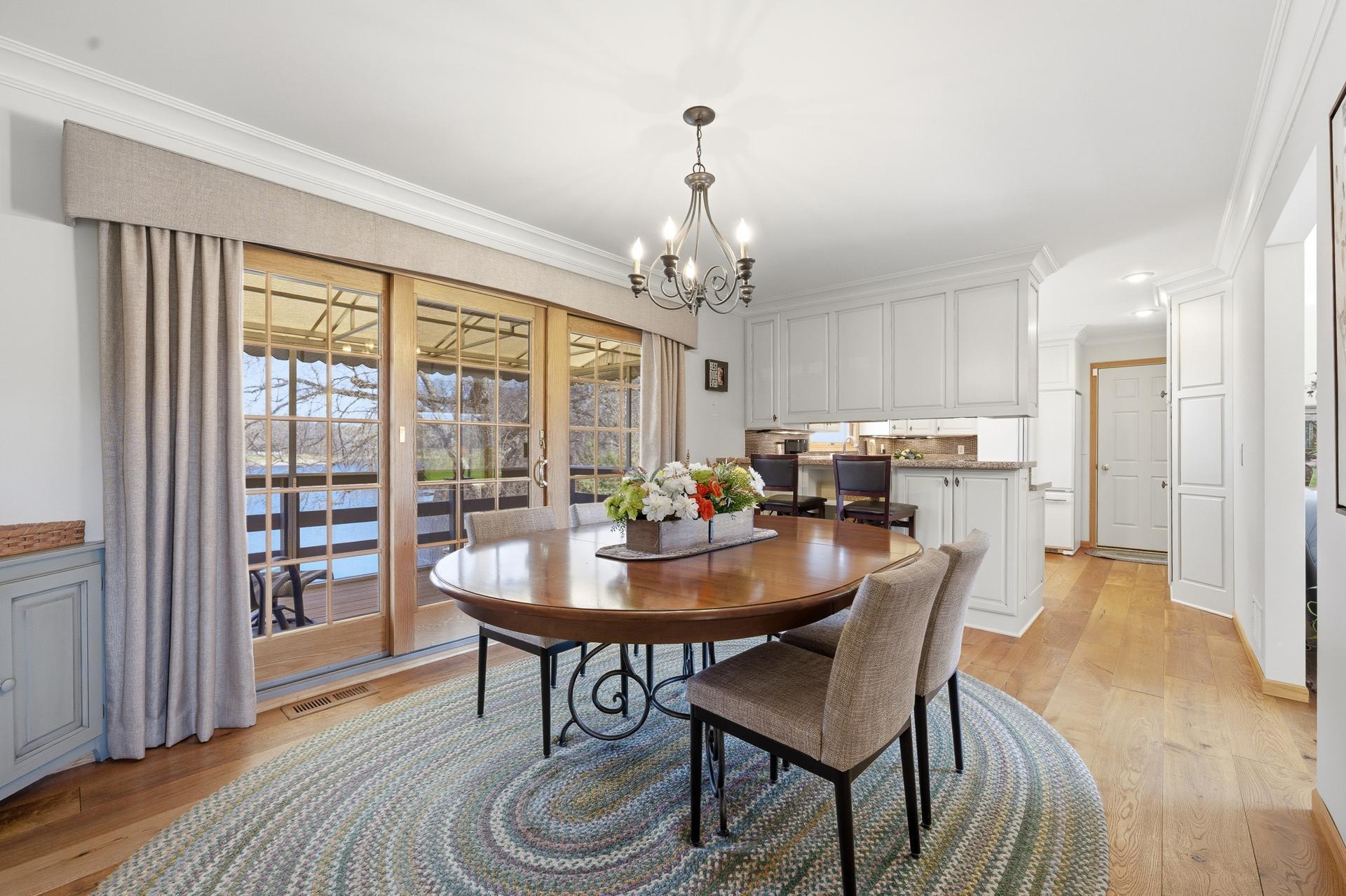 Formal Dining Room with crown molding that extends into the Kitchen.