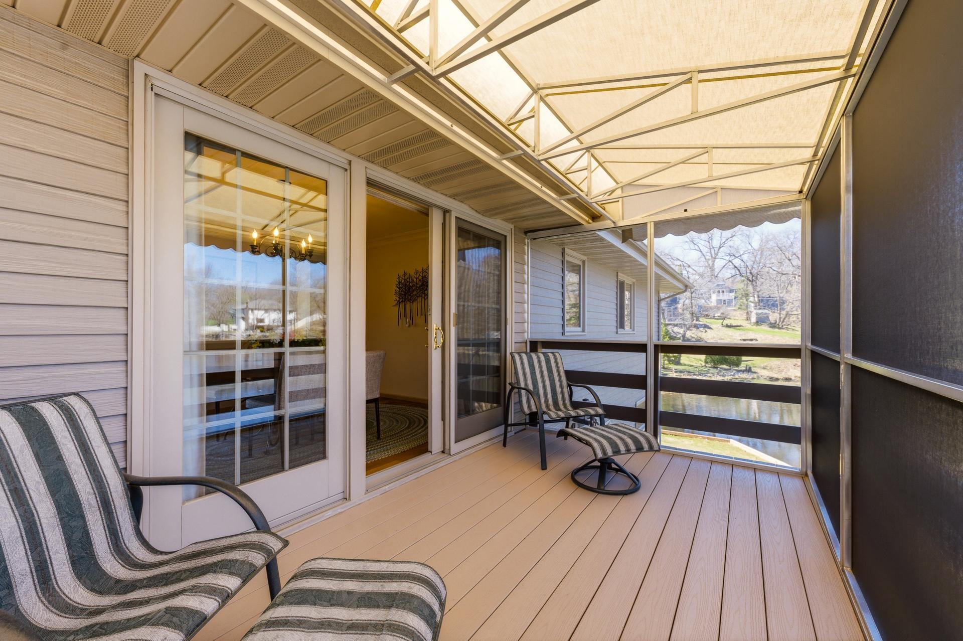 Screened deck with maintenance-free flooring.