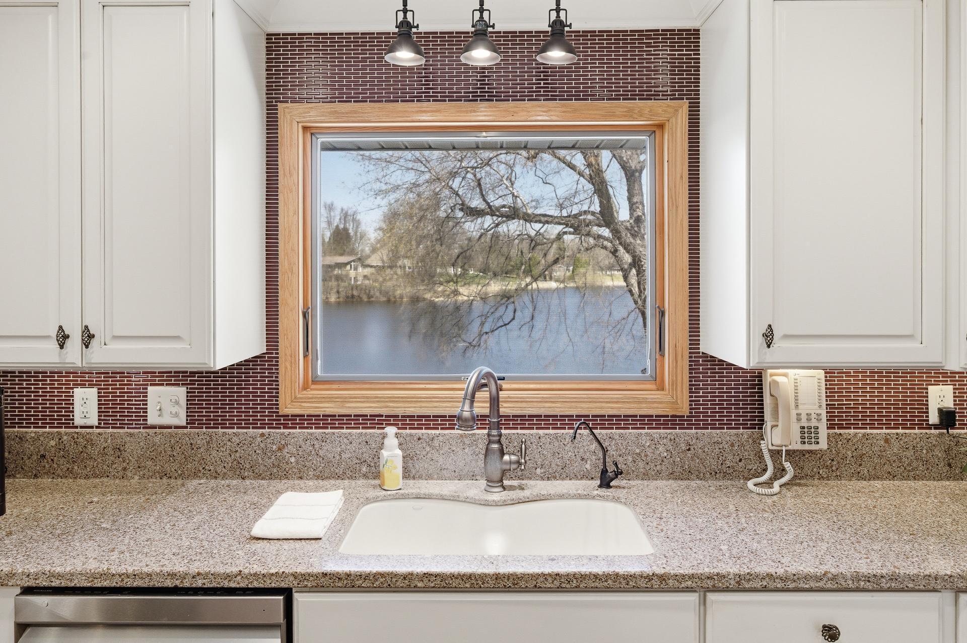 Kitchen picture window with beautiful lake views.