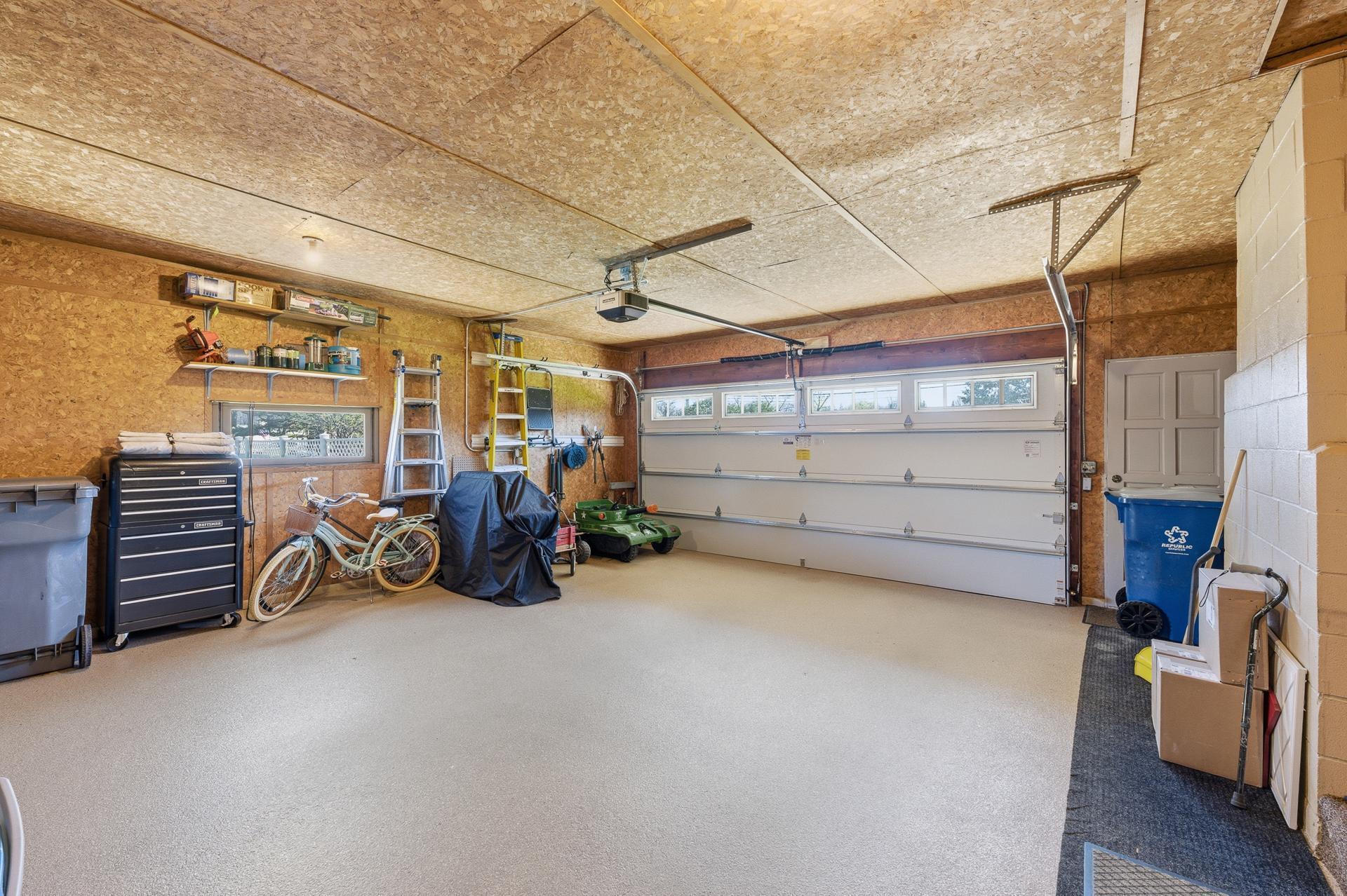 Main level 22x24 garage with epoxy floor.