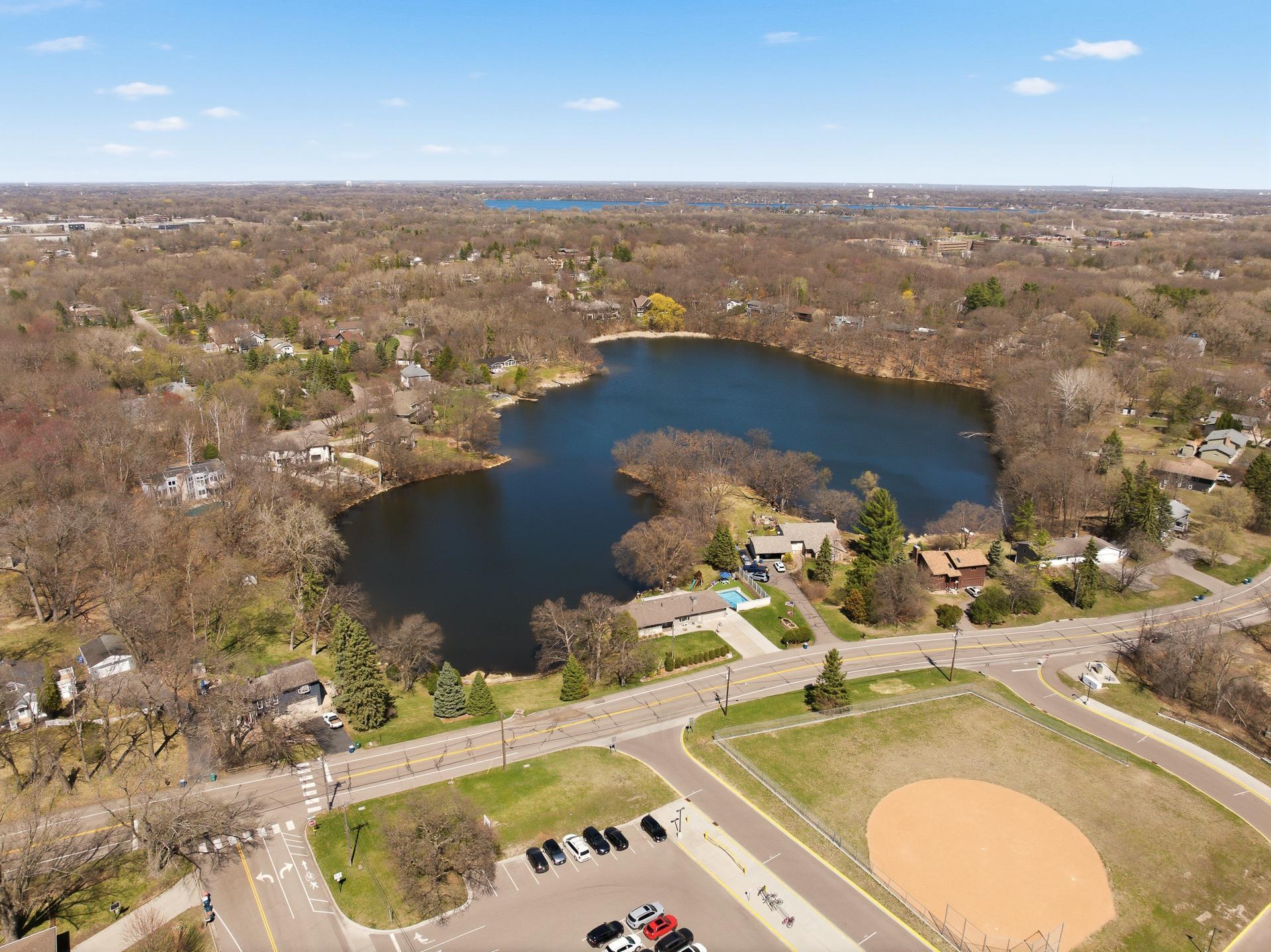 Aerial view of Cavanaugh Lake with home shown in the center of photo.