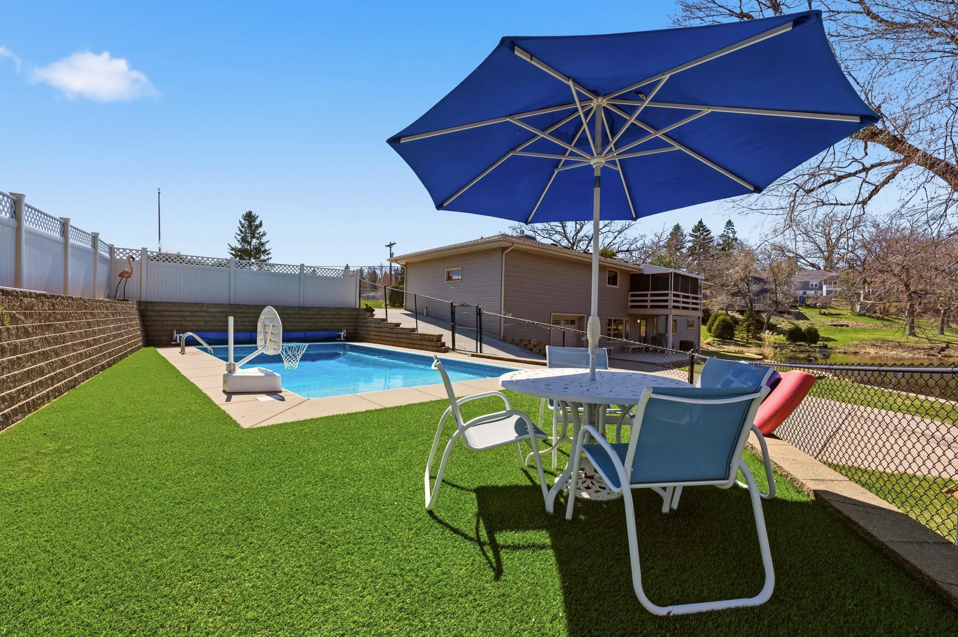 Artificial turf around pool installed 2018.