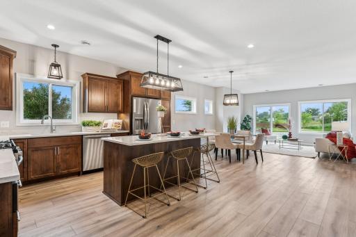 Open Design - stunning kitchen with custom, soft close cabinets, quarts center island, walk-in pantry and more!