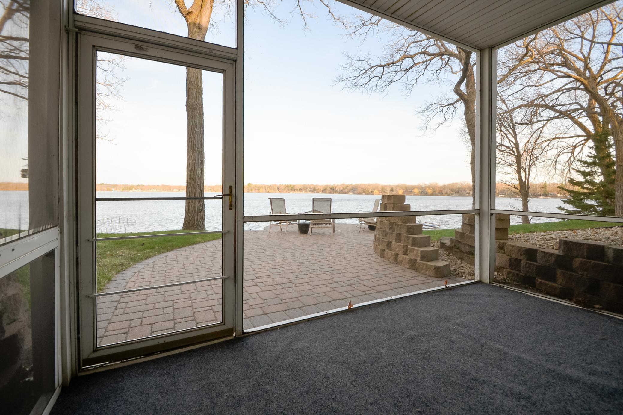 Screened in porch off lower level family room