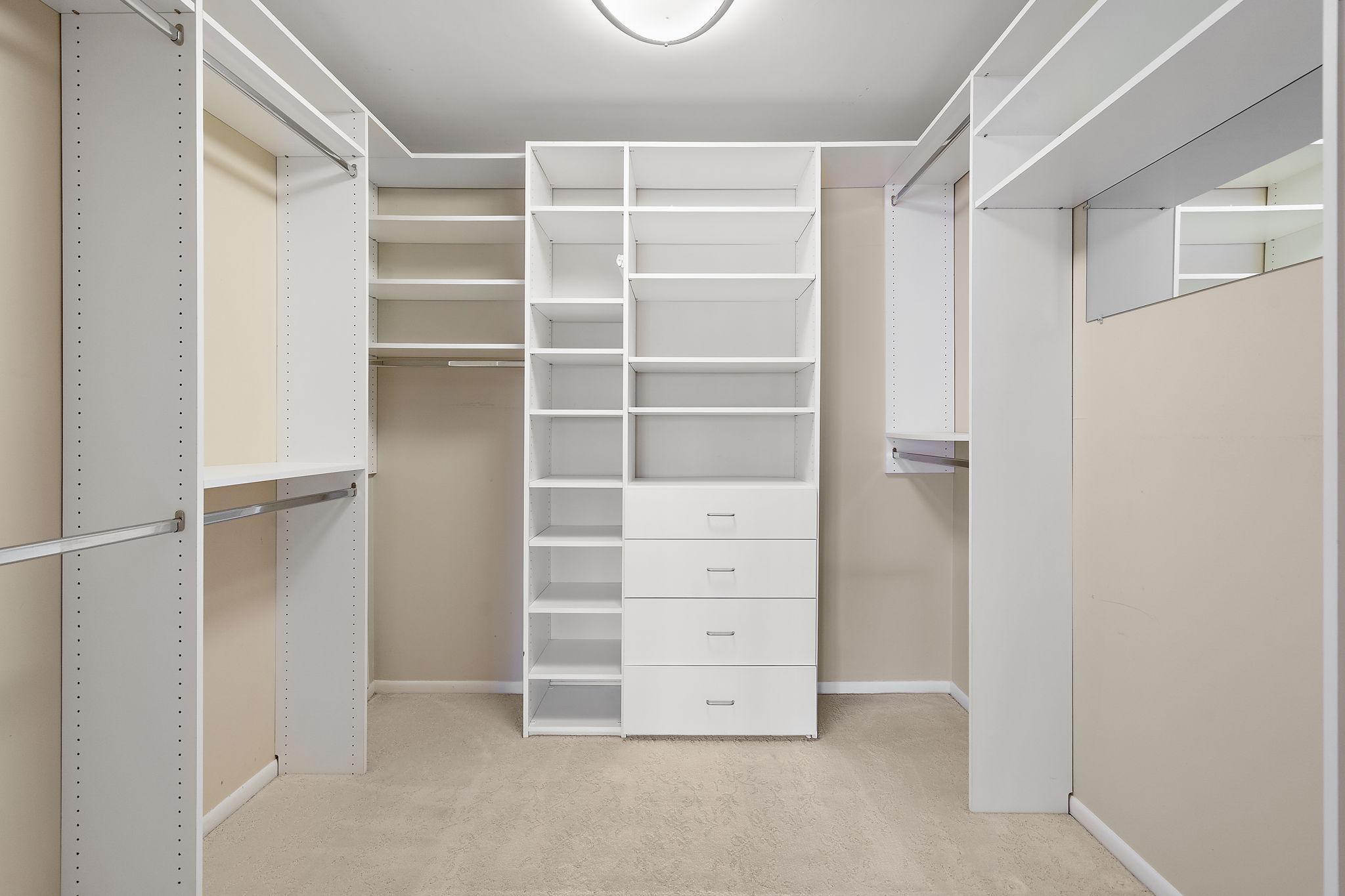 Primary Bedroom Closet - So much Storage!