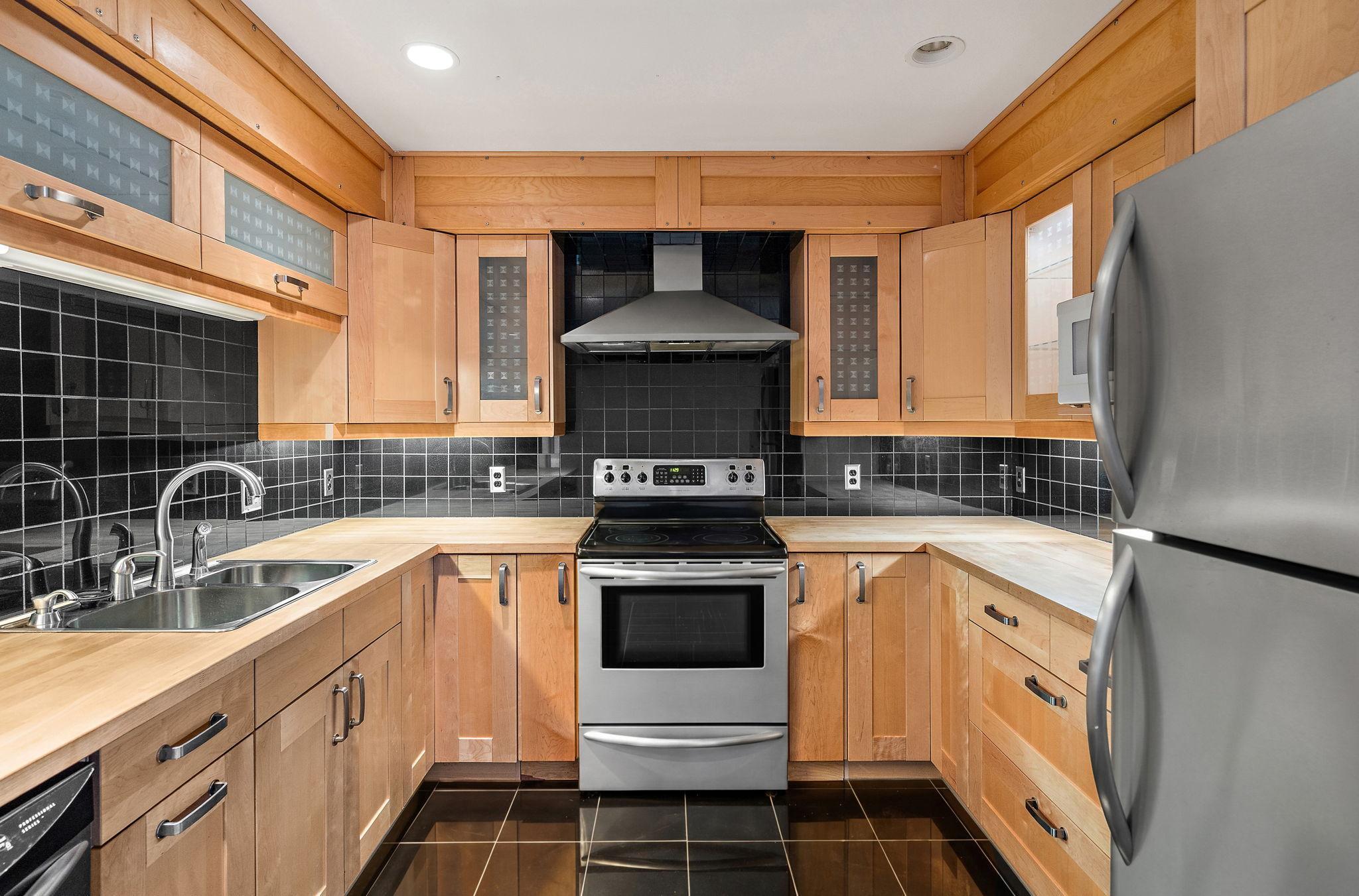 Gorgeous custom cabinets & butcher block counters