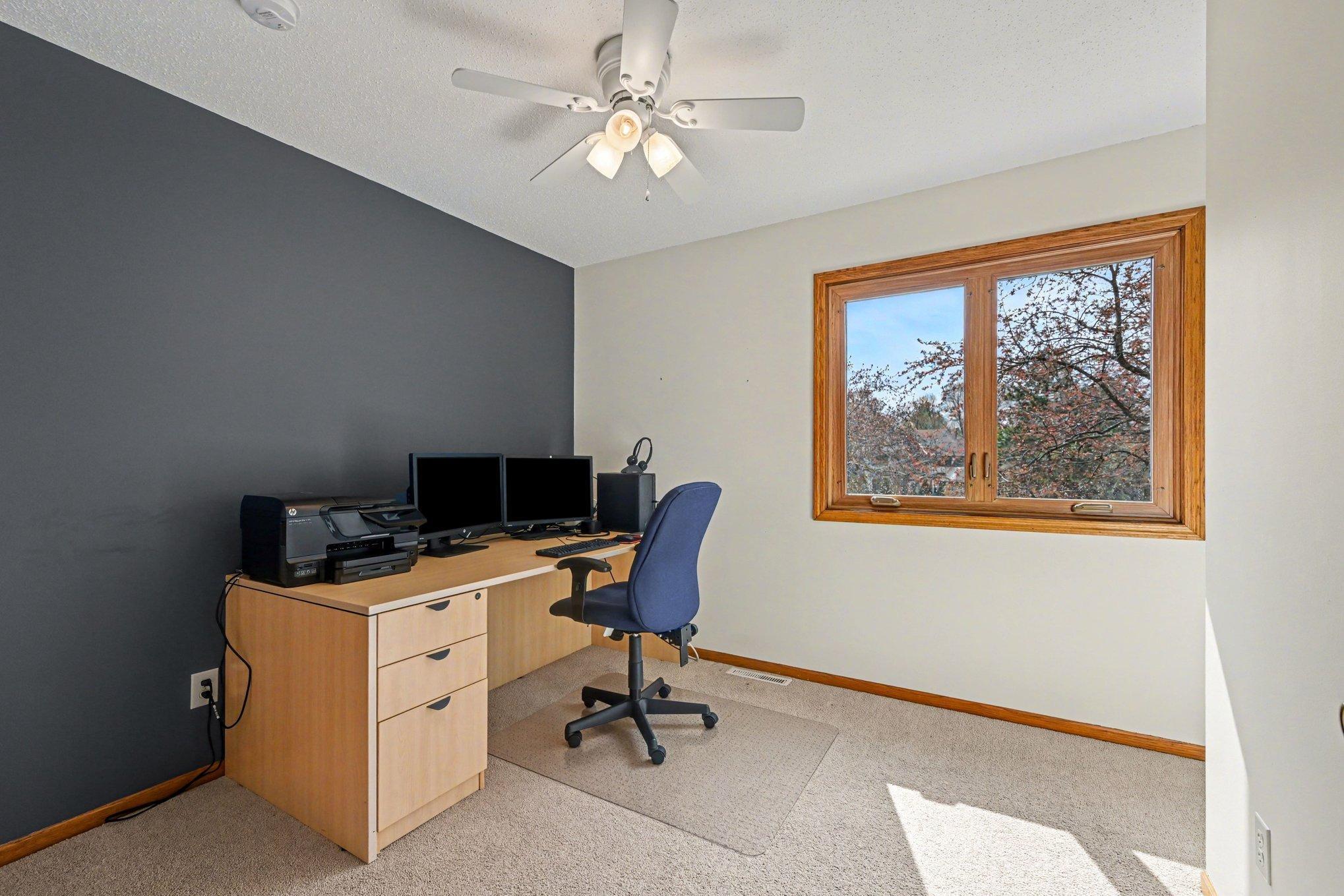 Flexible upper-level space that can be used as a home office or bedroom.