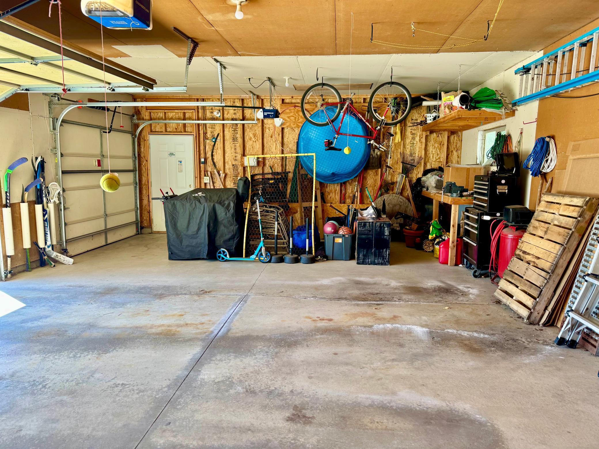 Third stall prides pretty of room for storage and a workbench.