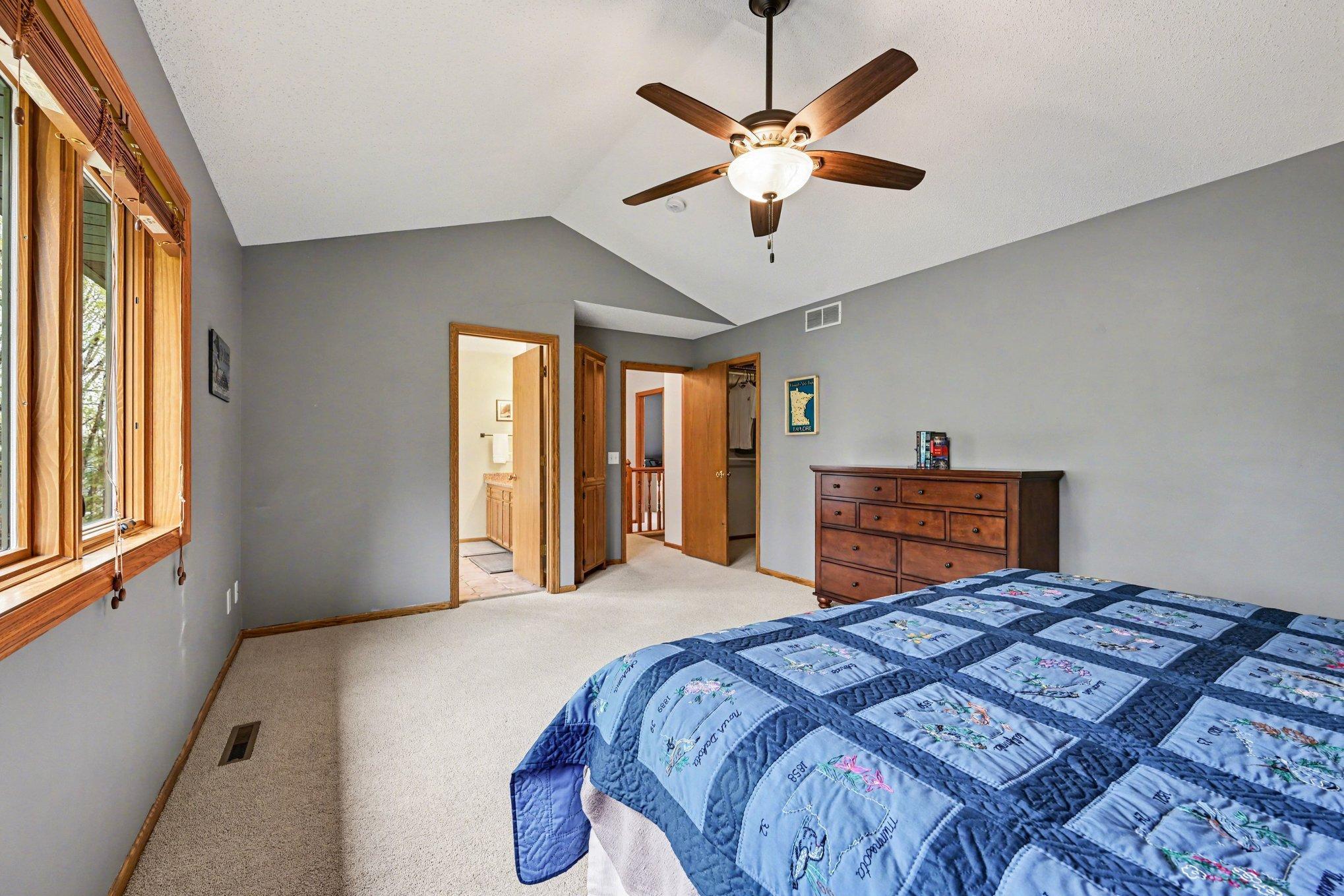 Owners suit and all upstairs bedrooms have ceiling fans.