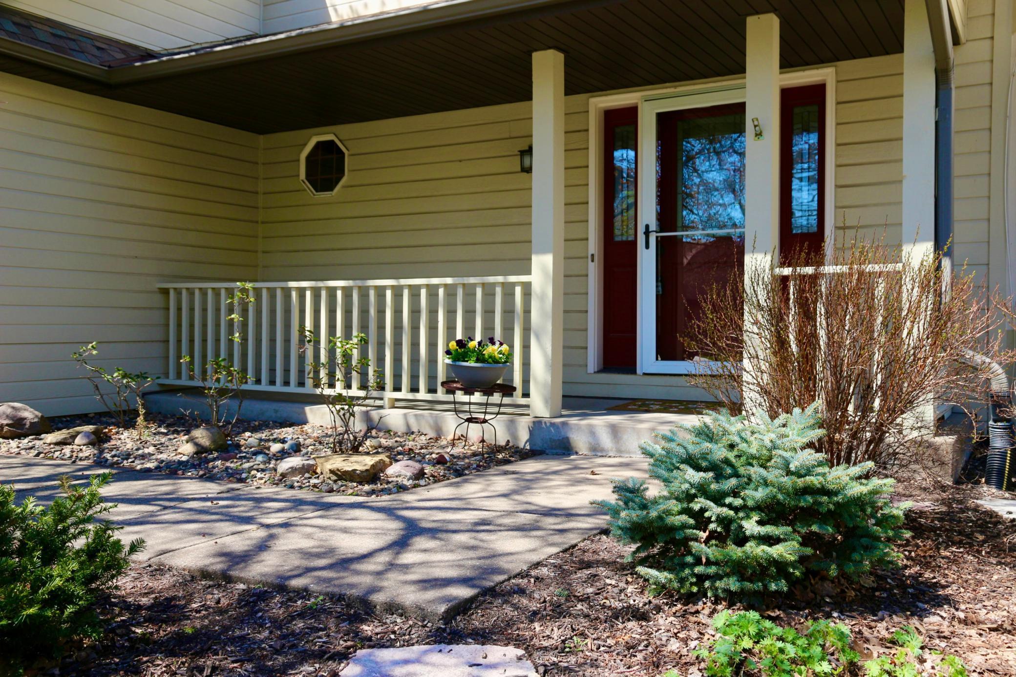 Front porch offers a welcoming space to sit and relax.
