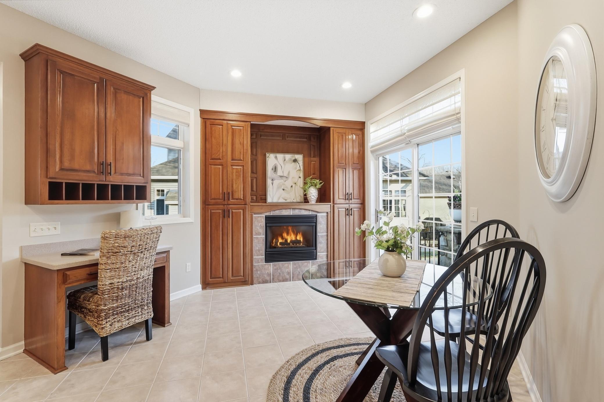 This welcoming space will be the heart of the home with built ins, cozy fireplace and walkout to your grand front patio.