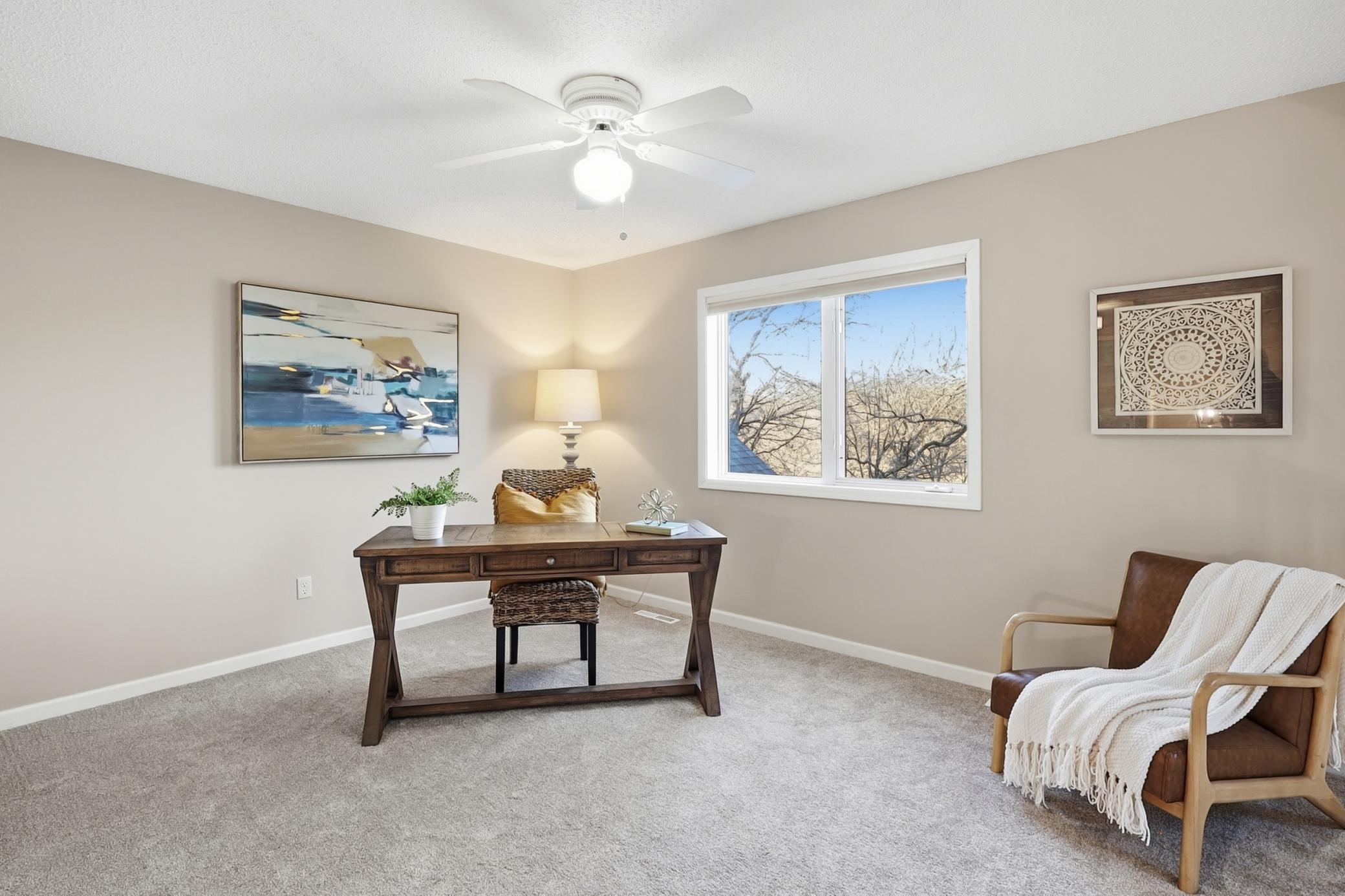 Loft area great for an office or play.