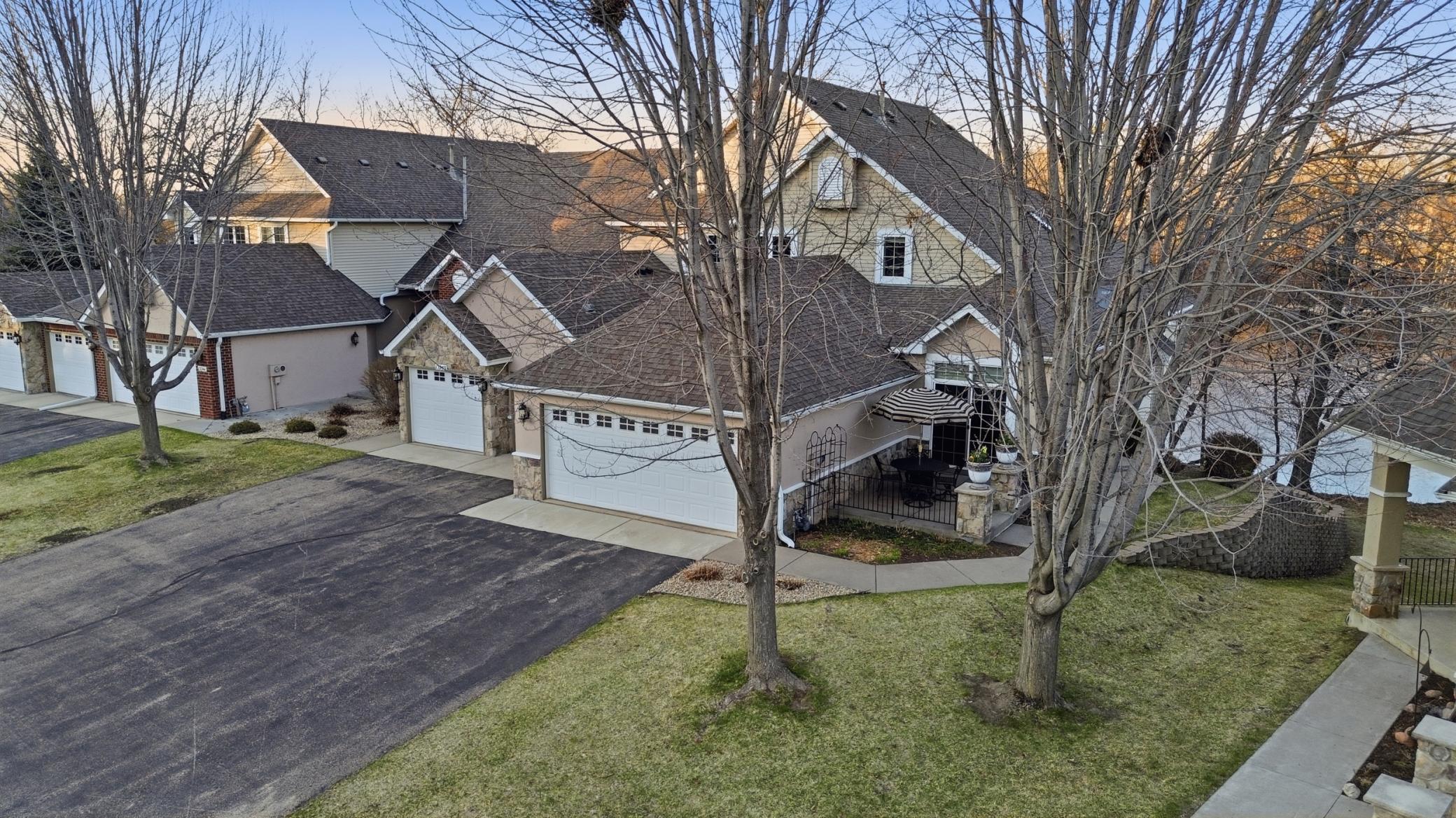 A spacious front patio creates a warm and inviting entrance, perfect for morning coffee or unwinding at the end of the day.