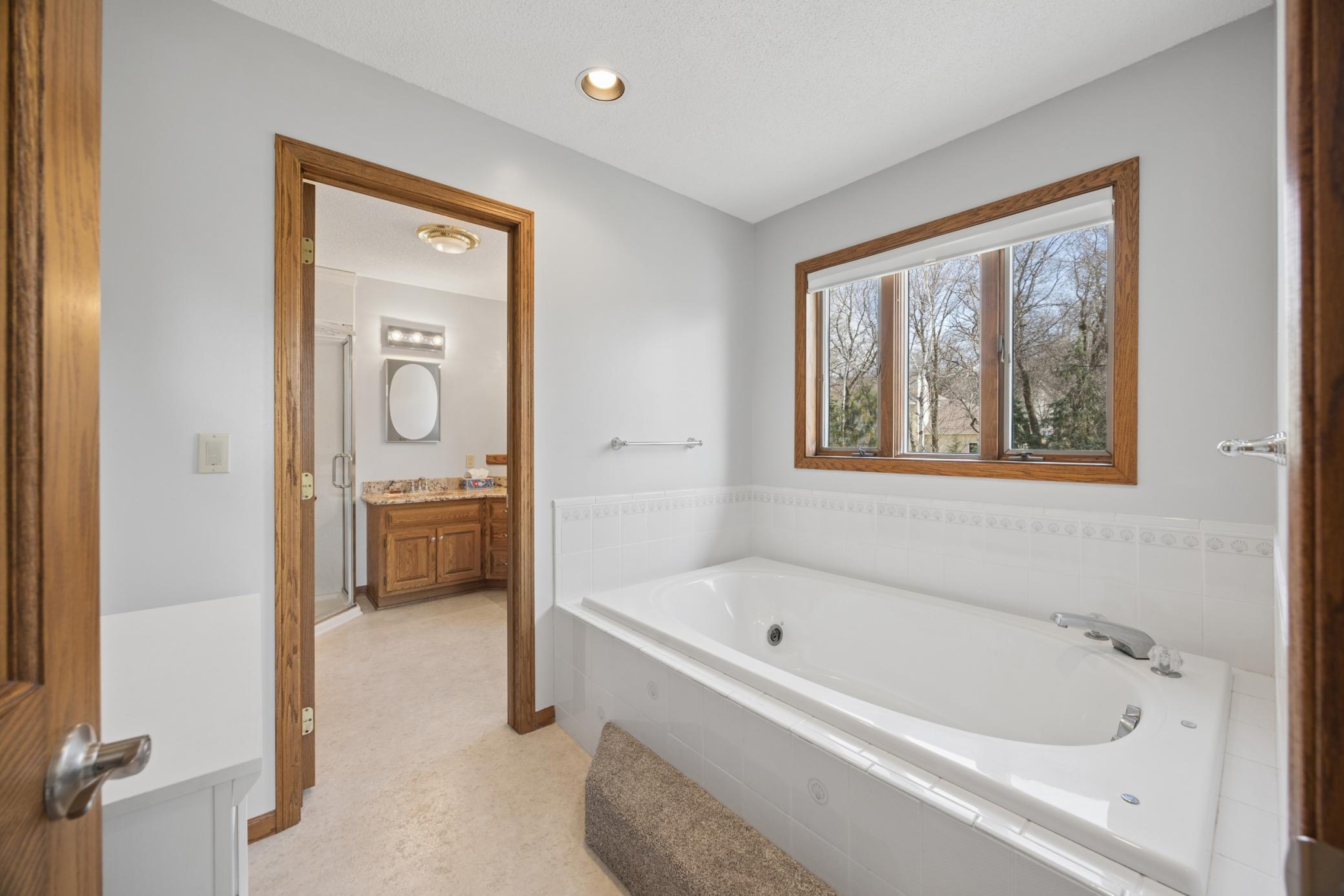 Jetted tub in primary suite.