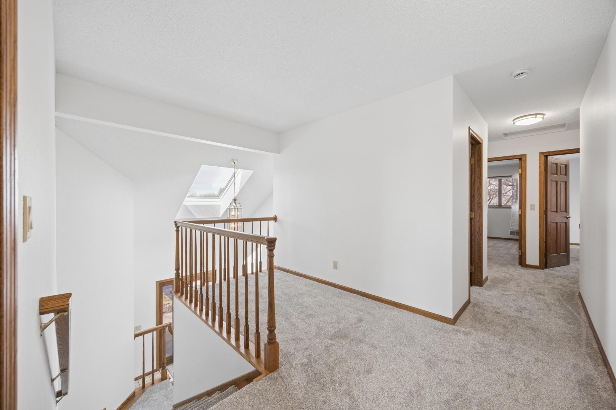 Sitting room. The entire upper level just had new carpeting installed.