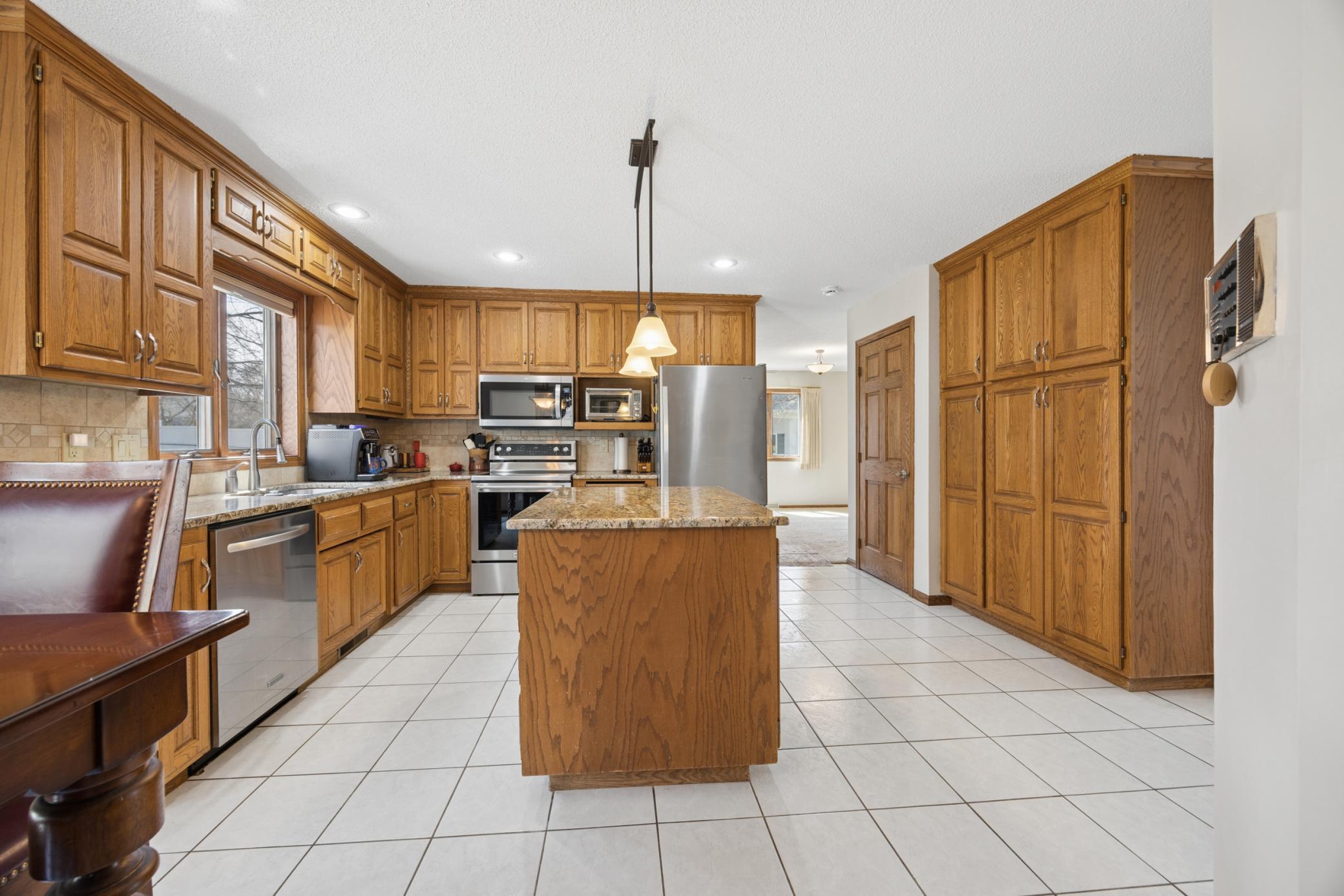 Kitchen leading to the formal dining room.