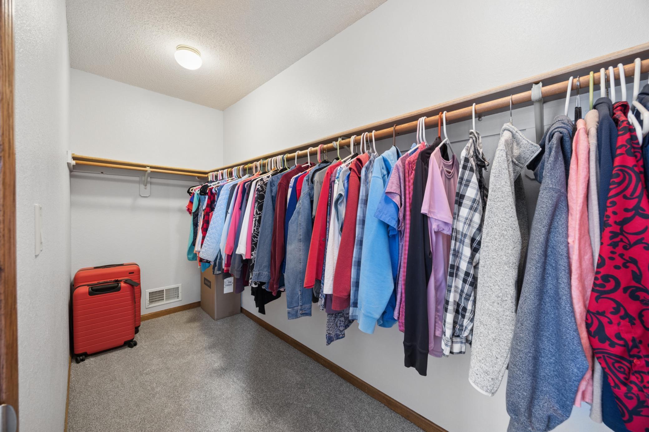 Primary suite walk in closet.