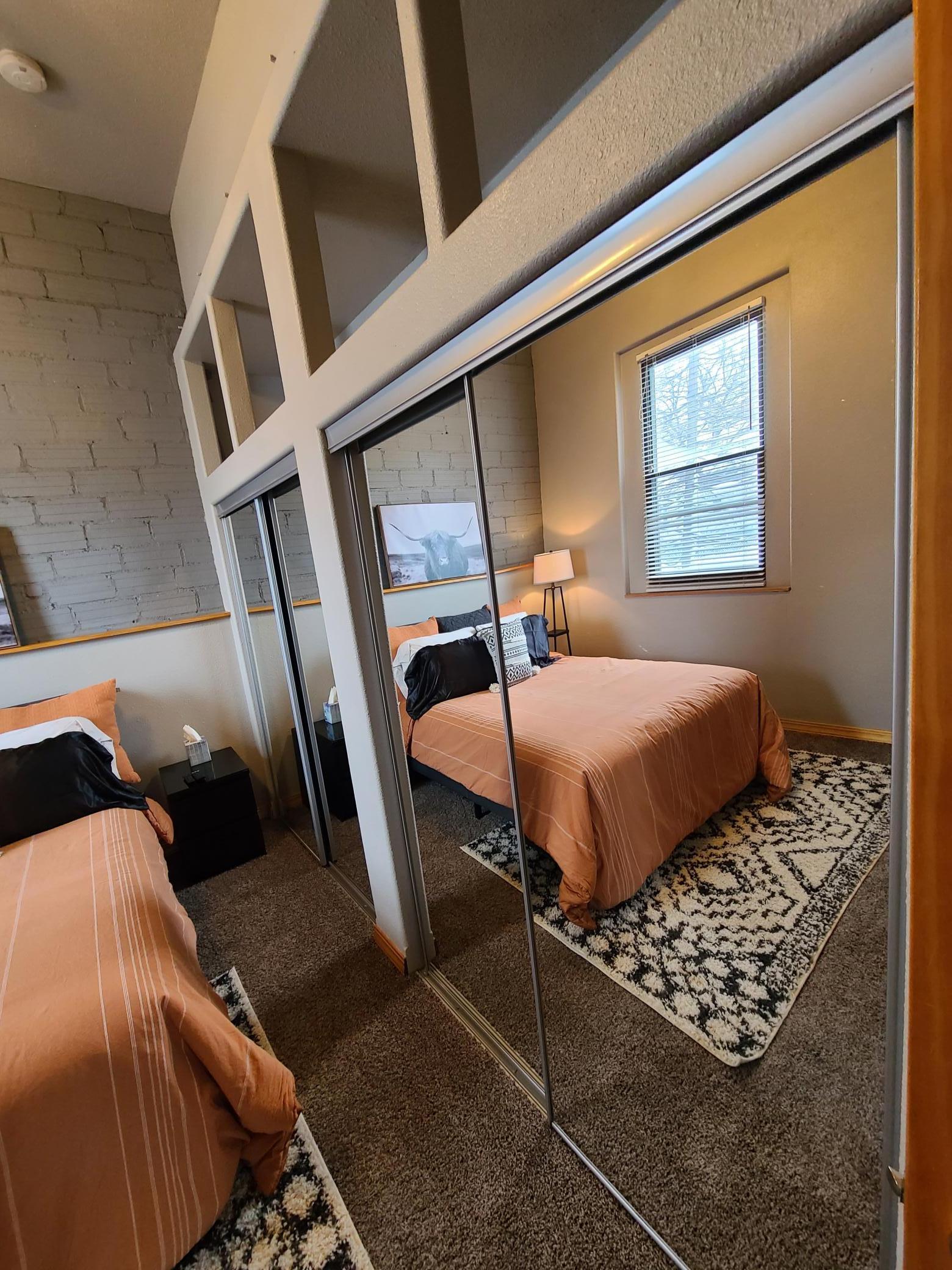 Bedroom 2 view 2, double closets