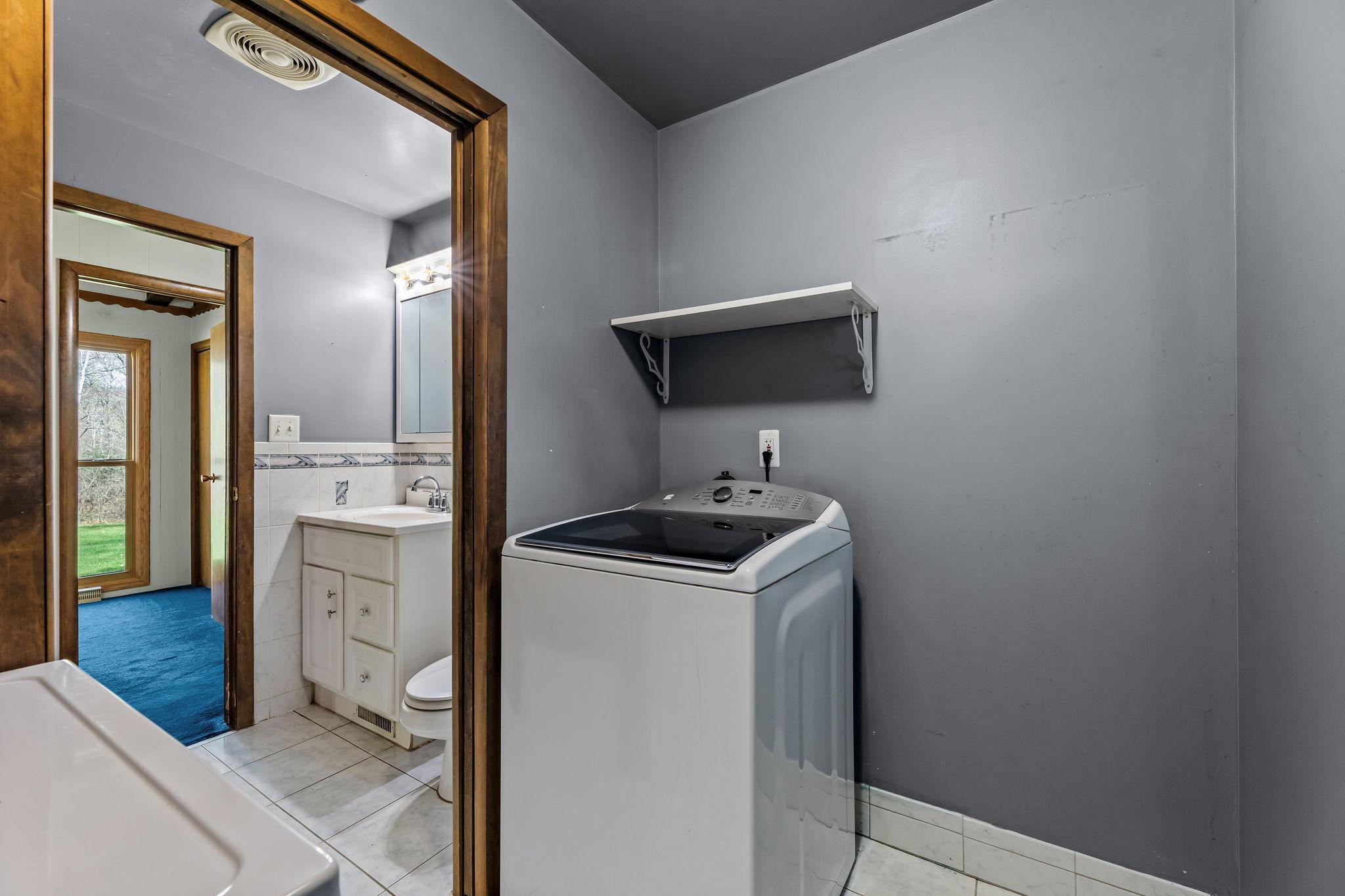Updated washer and dryer in the main floor laundry room.