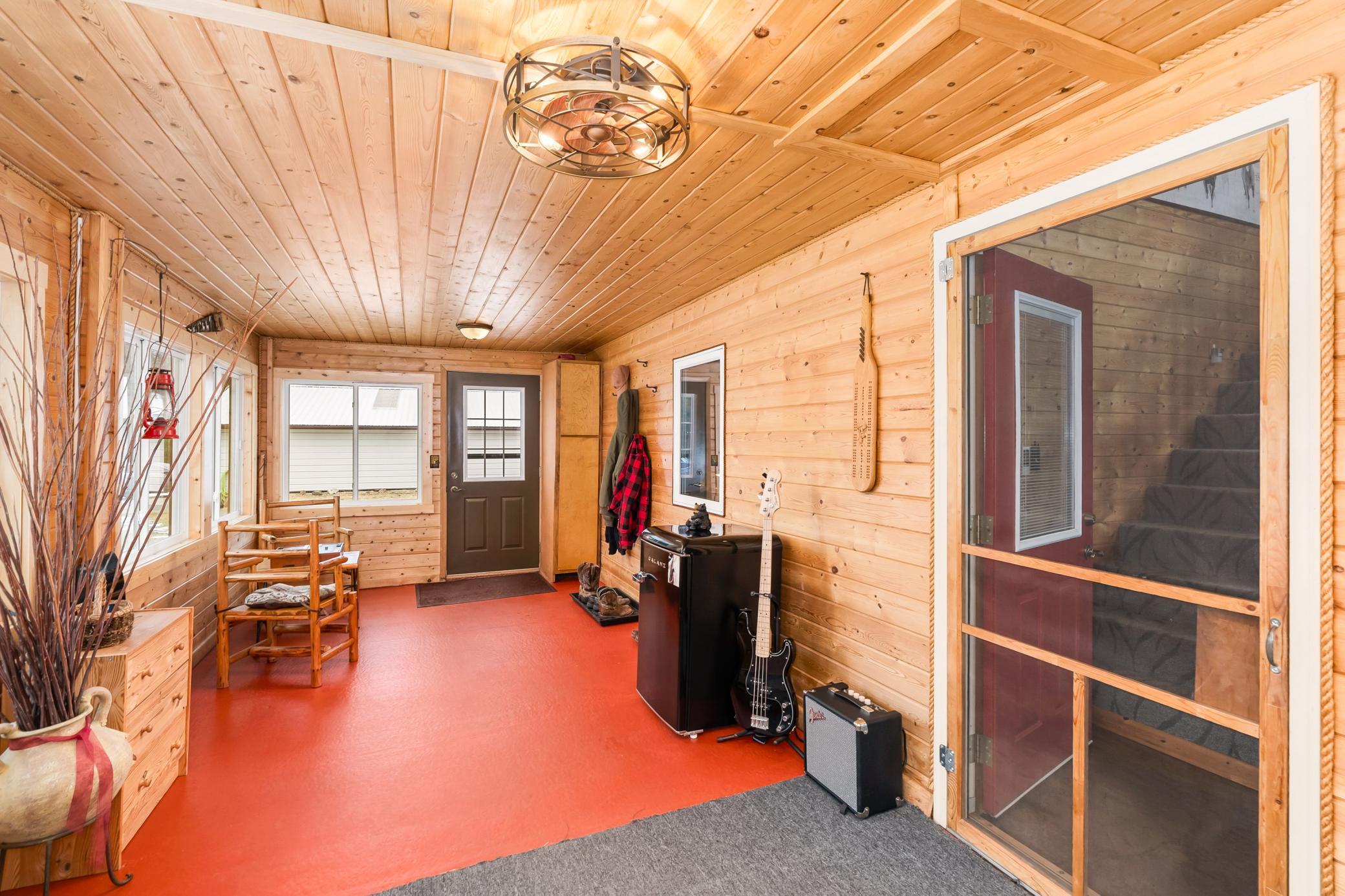 4-season porch and entrance to the home